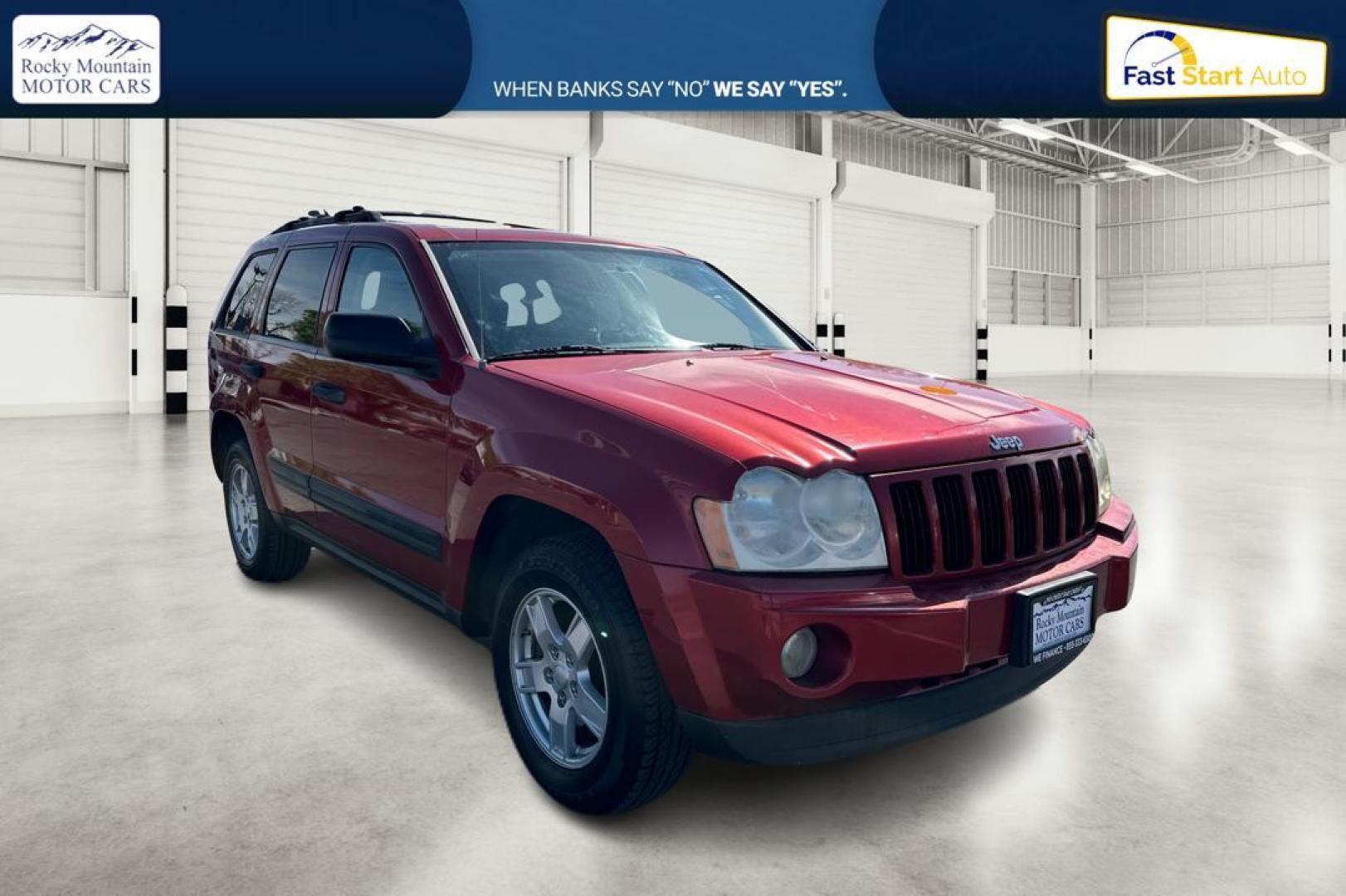 2005 Red Jeep Grand Cherokee Laredo 2WD (1J8HS48N25C) with an 4.7L V8 SOHC 16V engine, 5-Speed Automatic Overdrive transmission, located at 344 S Washington Blvd, Ogden, UT, 84404, (801) 399-1799, 41.255482, -111.970848 - Photo#0