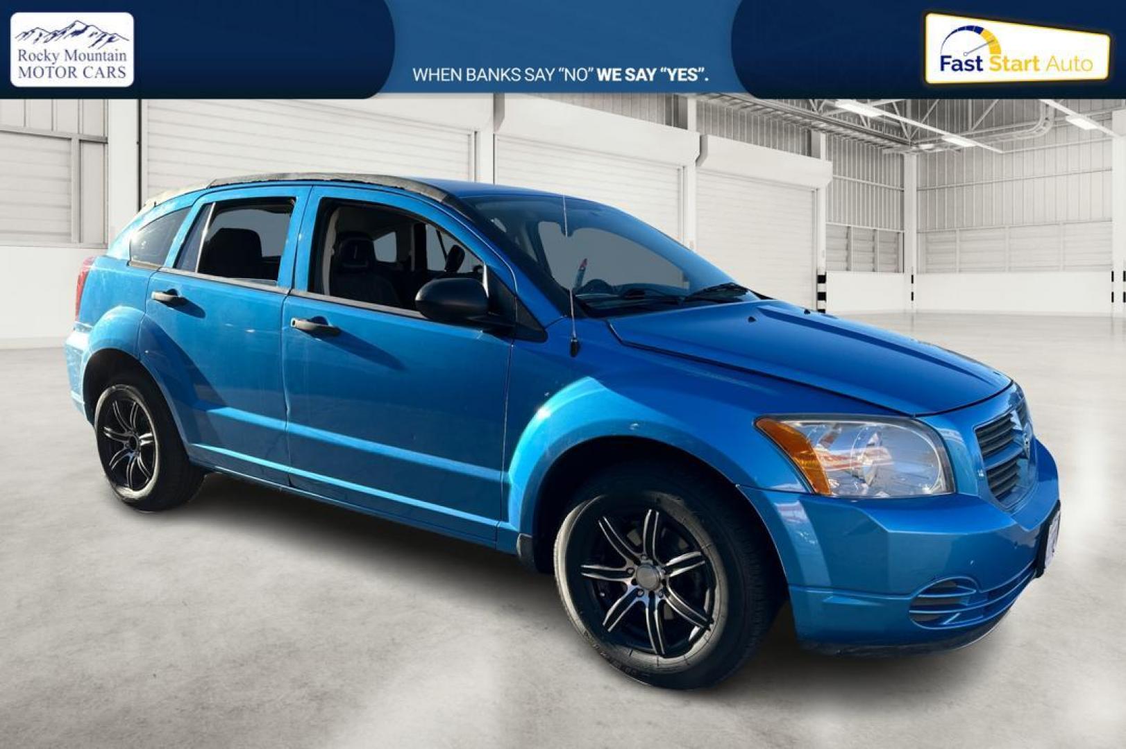 2009 Blue Dodge Caliber SE (1B3HB28A69D) with an 2.0L L4 DOHC 16V engine, Automatic, CVT transmission, located at 344 S Washington Blvd, Ogden, UT, 84404, (801) 399-1799, 41.255482, -111.970848 - Photo#0