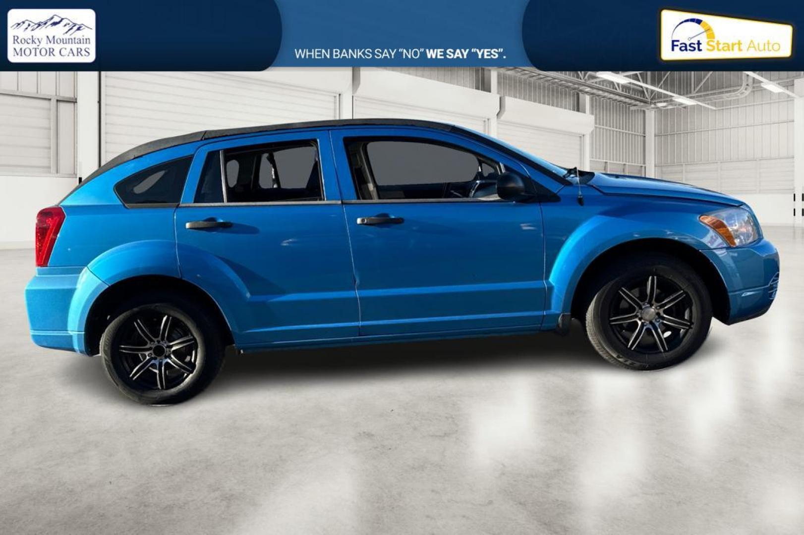 2009 Blue Dodge Caliber SE (1B3HB28A69D) with an 2.0L L4 DOHC 16V engine, Automatic, CVT transmission, located at 344 S Washington Blvd, Ogden, UT, 84404, (801) 399-1799, 41.255482, -111.970848 - Photo#1