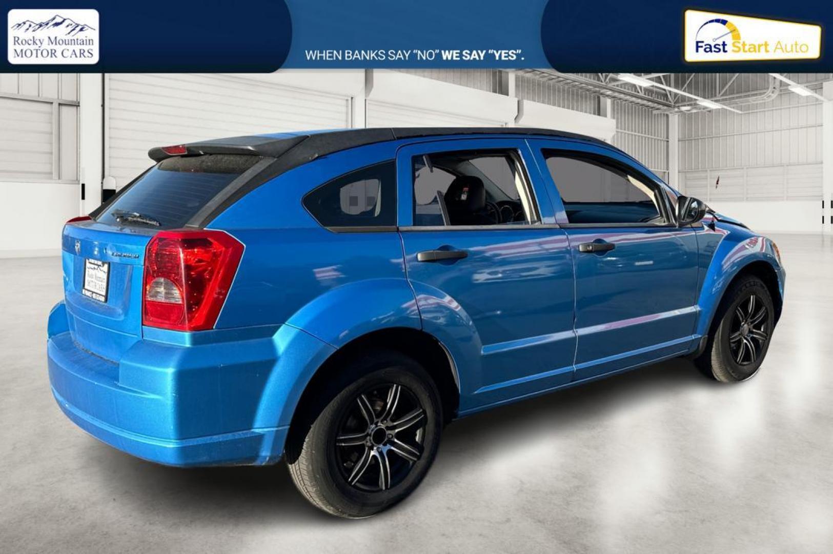 2009 Blue Dodge Caliber SE (1B3HB28A69D) with an 2.0L L4 DOHC 16V engine, Automatic, CVT transmission, located at 344 S Washington Blvd, Ogden, UT, 84404, (801) 399-1799, 41.255482, -111.970848 - Photo#2