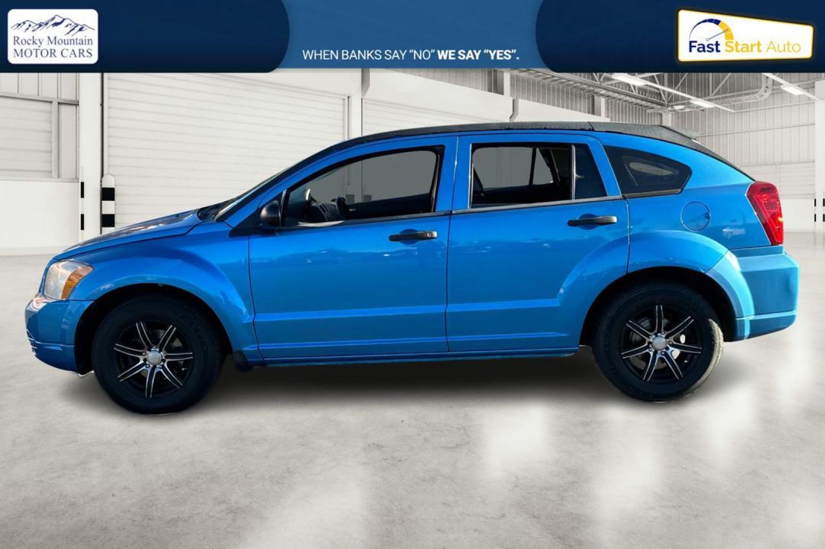 2009 Blue Dodge Caliber SE (1B3HB28A69D) with an 2.0L L4 DOHC 16V engine, Automatic, CVT transmission, located at 344 S Washington Blvd, Ogden, UT, 84404, (801) 399-1799, 41.255482, -111.970848 - Photo#6