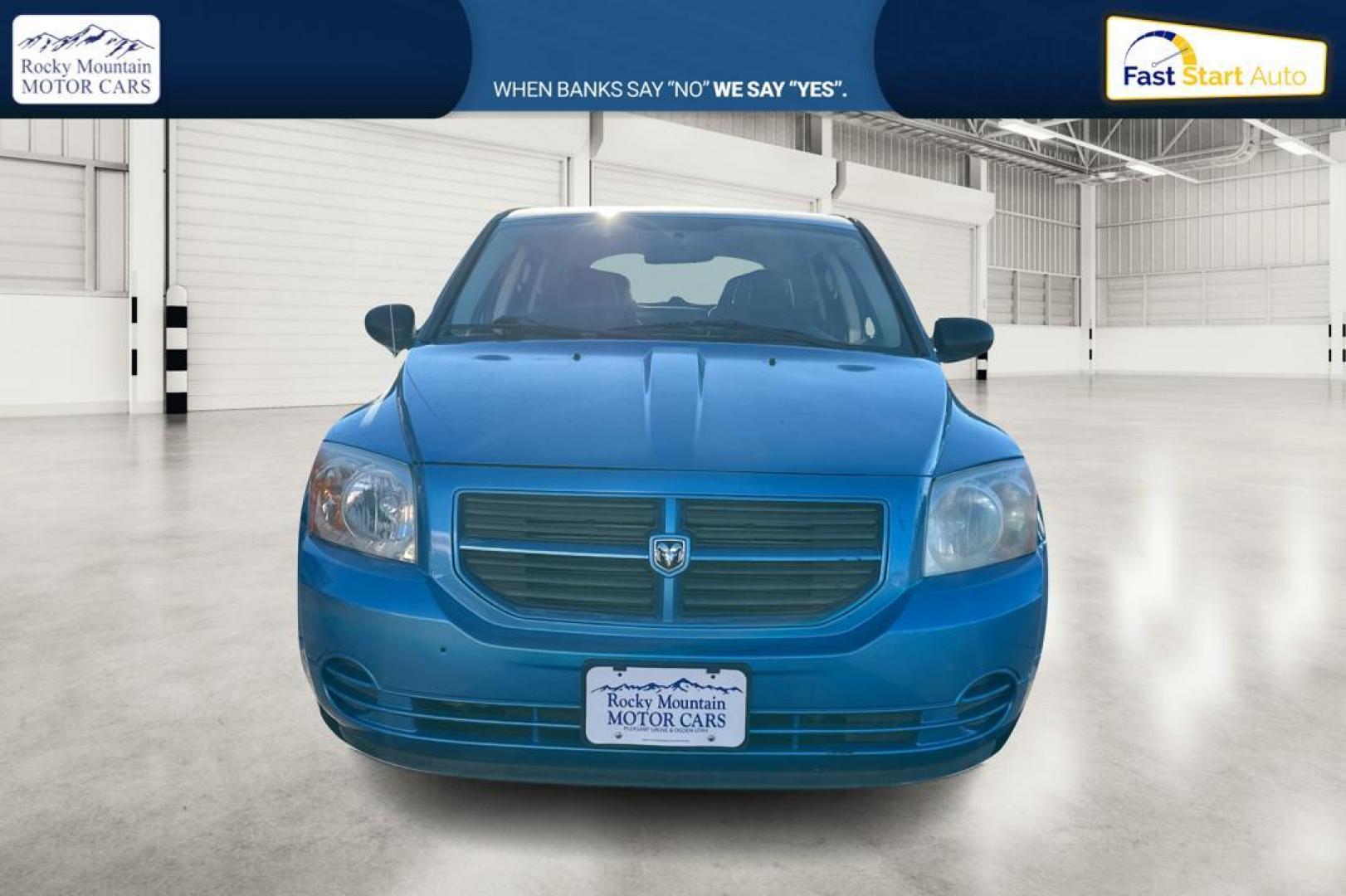 2009 Blue Dodge Caliber SE (1B3HB28A69D) with an 2.0L L4 DOHC 16V engine, Automatic, CVT transmission, located at 344 S Washington Blvd, Ogden, UT, 84404, (801) 399-1799, 41.255482, -111.970848 - Photo#9