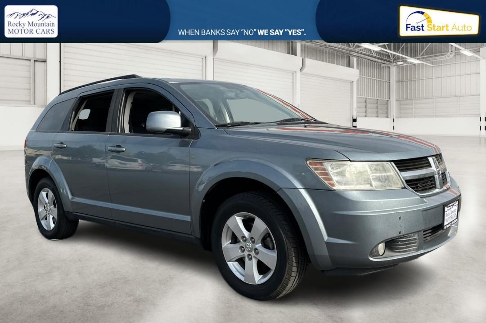 2010 Blue Dodge Journey SXT (3D4PG5FV9AT) with an 3.5L V6 SOHC 24V engine, 6-Speed Automatic transmission, located at 767 S State Road, Pleasant Grove, UT, 84062, (801) 785-1058, 40.354839, -111.736687 - Photo#0