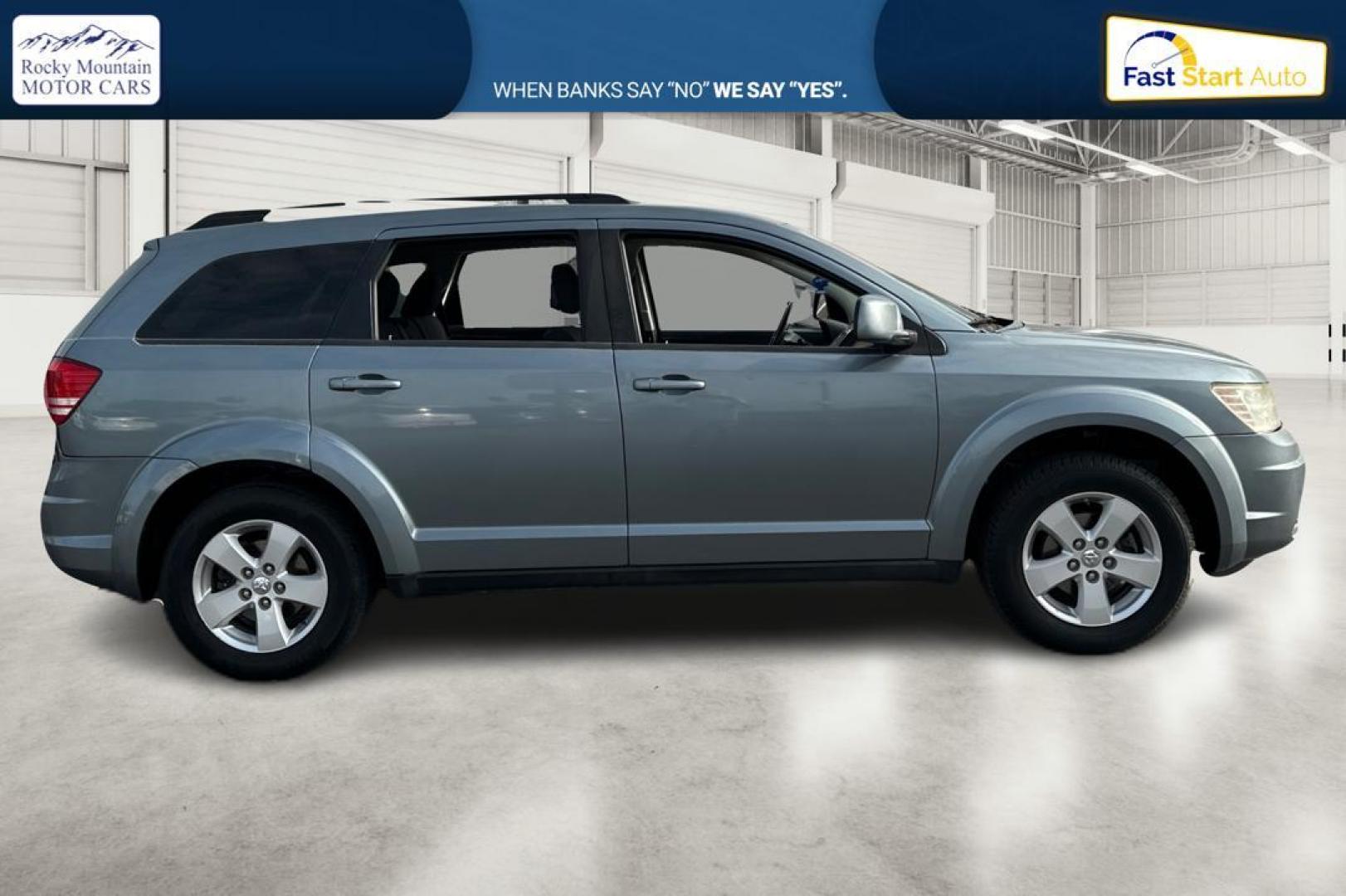 2010 Blue Dodge Journey SXT (3D4PG5FV9AT) with an 3.5L V6 SOHC 24V engine, 6-Speed Automatic transmission, located at 767 S State Road, Pleasant Grove, UT, 84062, (801) 785-1058, 40.354839, -111.736687 - Photo#1