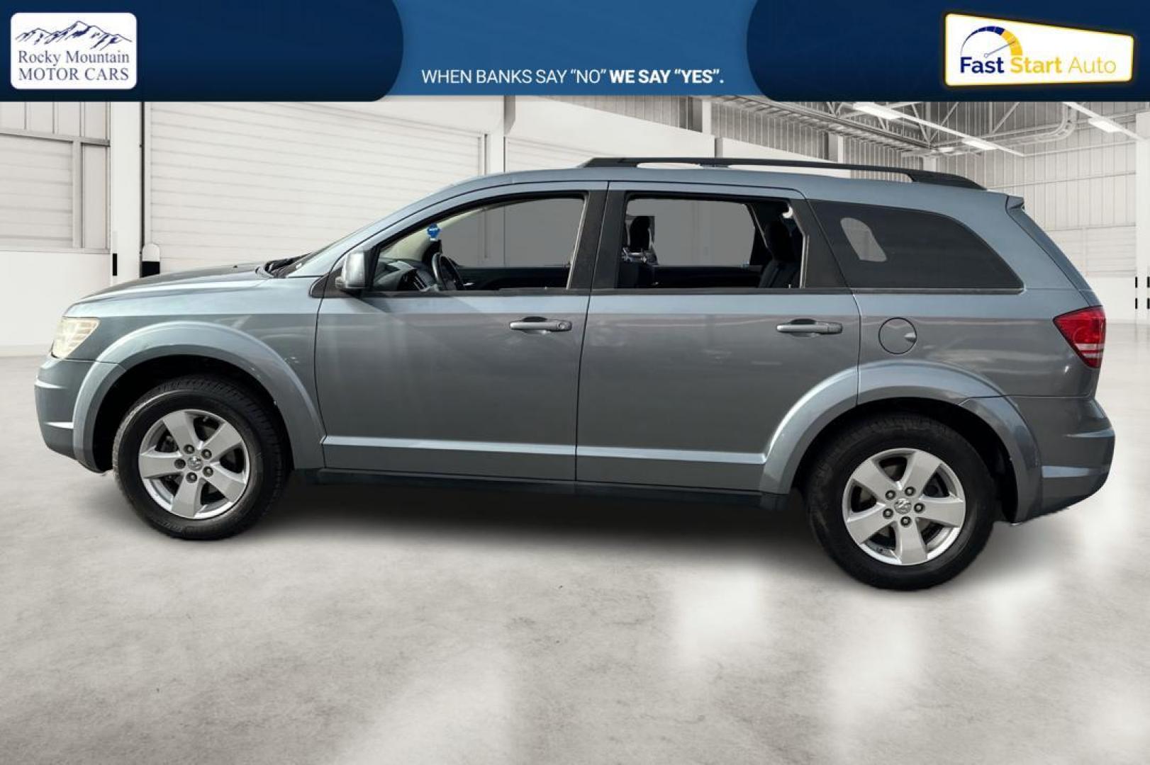 2010 Blue Dodge Journey SXT (3D4PG5FV9AT) with an 3.5L V6 SOHC 24V engine, 6-Speed Automatic transmission, located at 767 S State Road, Pleasant Grove, UT, 84062, (801) 785-1058, 40.354839, -111.736687 - Photo#5