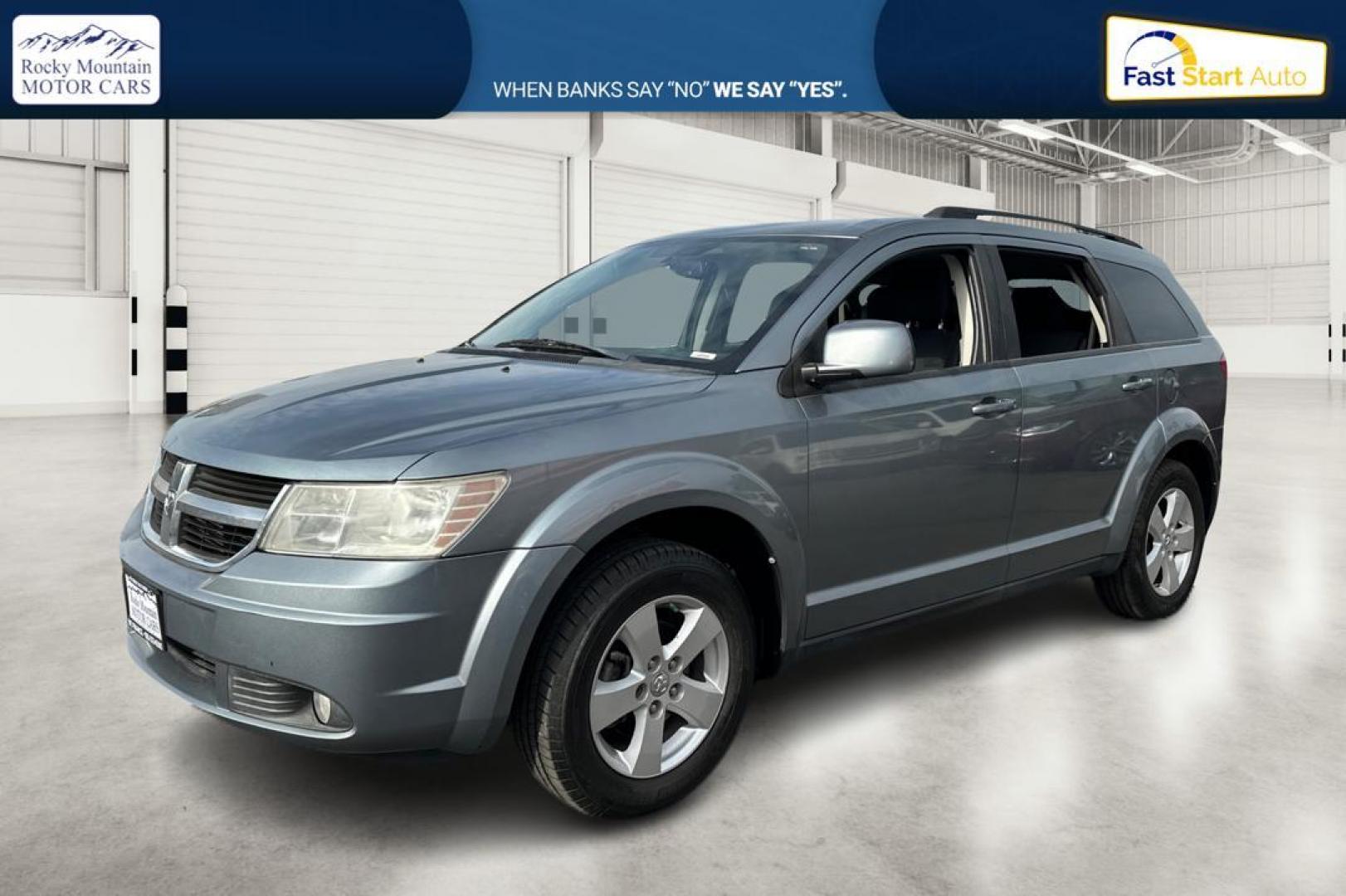 2010 Blue Dodge Journey SXT (3D4PG5FV9AT) with an 3.5L V6 SOHC 24V engine, 6-Speed Automatic transmission, located at 767 S State Road, Pleasant Grove, UT, 84062, (801) 785-1058, 40.354839, -111.736687 - Photo#6