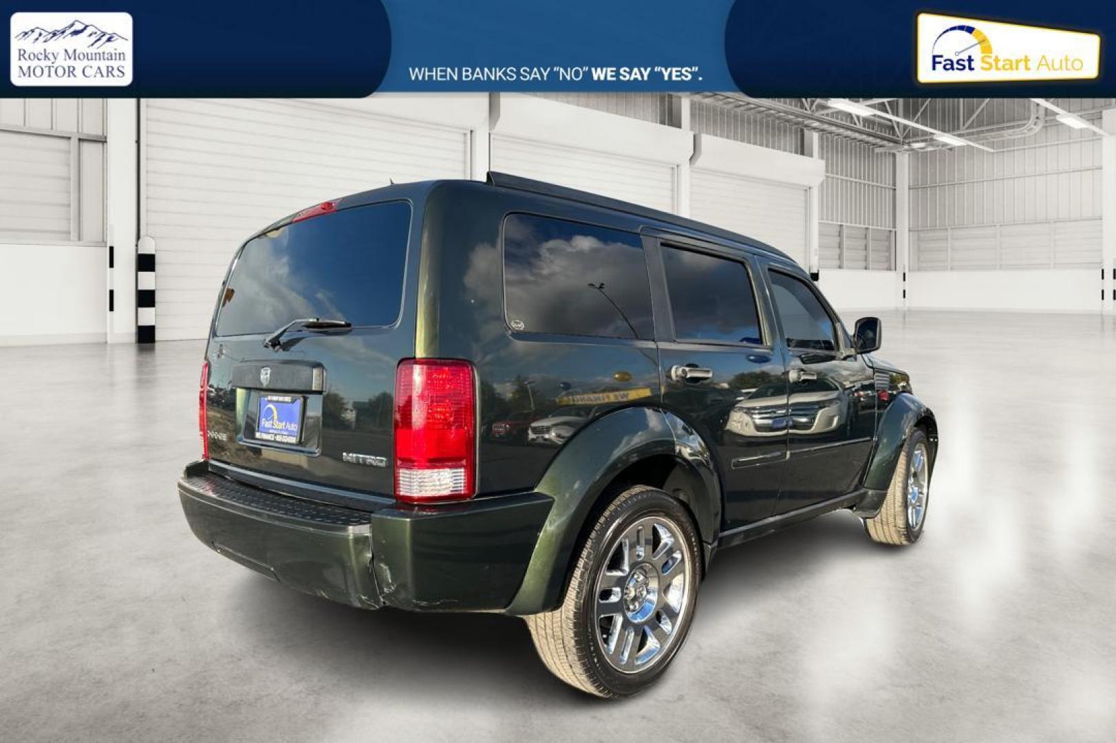 2010 Green Dodge Nitro Heat 2WD (1D4PT4GKXAW) with an 3.7L V6 SOHC 12V engine, 4-Speed Automatic transmission, located at 7755 State Street, Midvale, UT, 84047, (801) 753-9063, 40.610329, -111.892159 - Photo#2