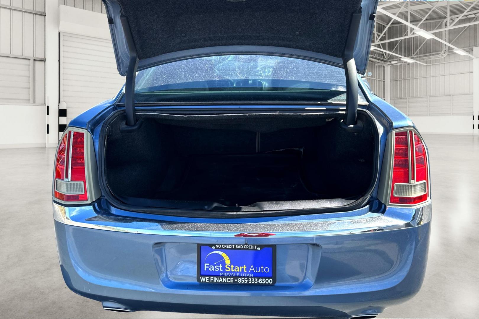 2011 Blue Chrysler 300 C RWD (2C3CA6CT5BH) with an 5.7L V8 OHV 16V engine, 5-Speed Automatic transmission, located at 7755 State Street, Midvale, UT, 84047, (801) 753-9063, 40.610329, -111.892159 - Photo#10