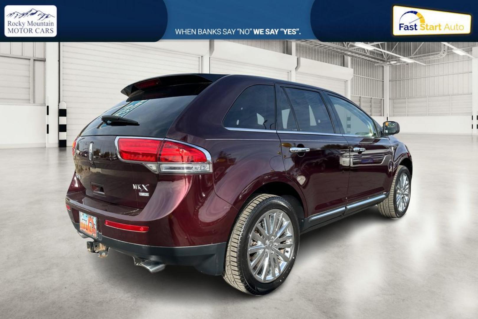 2011 Red Lincoln MKX AWD (2LMDJ8JK2BB) with an 3.7L V6 DOHC 24V engine, 6-Speed Automatic transmission, located at 7755 State Street, Midvale, UT, 84047, (801) 753-9063, 40.610329, -111.892159 - Photo#2