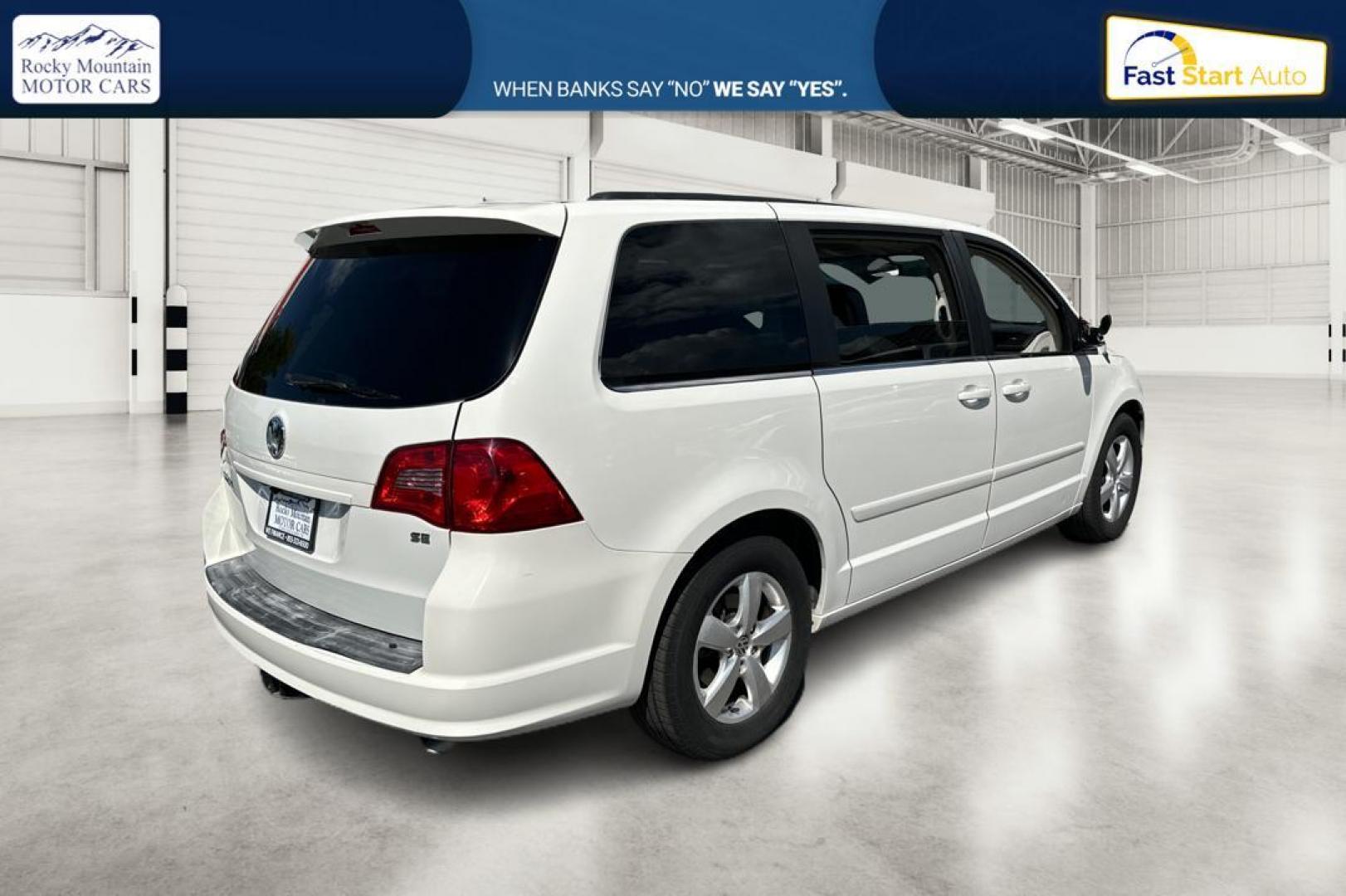 2011 White Volkswagen Routan SE (2V4RW3DG8BR) with an 3.6L V6 DOHC 24V engine, 6-Speed Automatic transmission, located at 344 S Washington Blvd, Ogden, UT, 84404, (801) 399-1799, 41.255482, -111.970848 - Photo#2