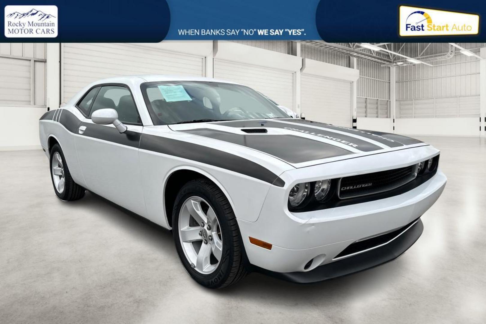 2012 White Dodge Challenger SXT (2C3CDYAG7CH) with an 3.6L V6 DOHC 24V engine, 4-Speed Automatic transmission, located at 344 S Washington Blvd, Ogden, UT, 84404, (801) 399-1799, 41.255482, -111.970848 - Photo#0