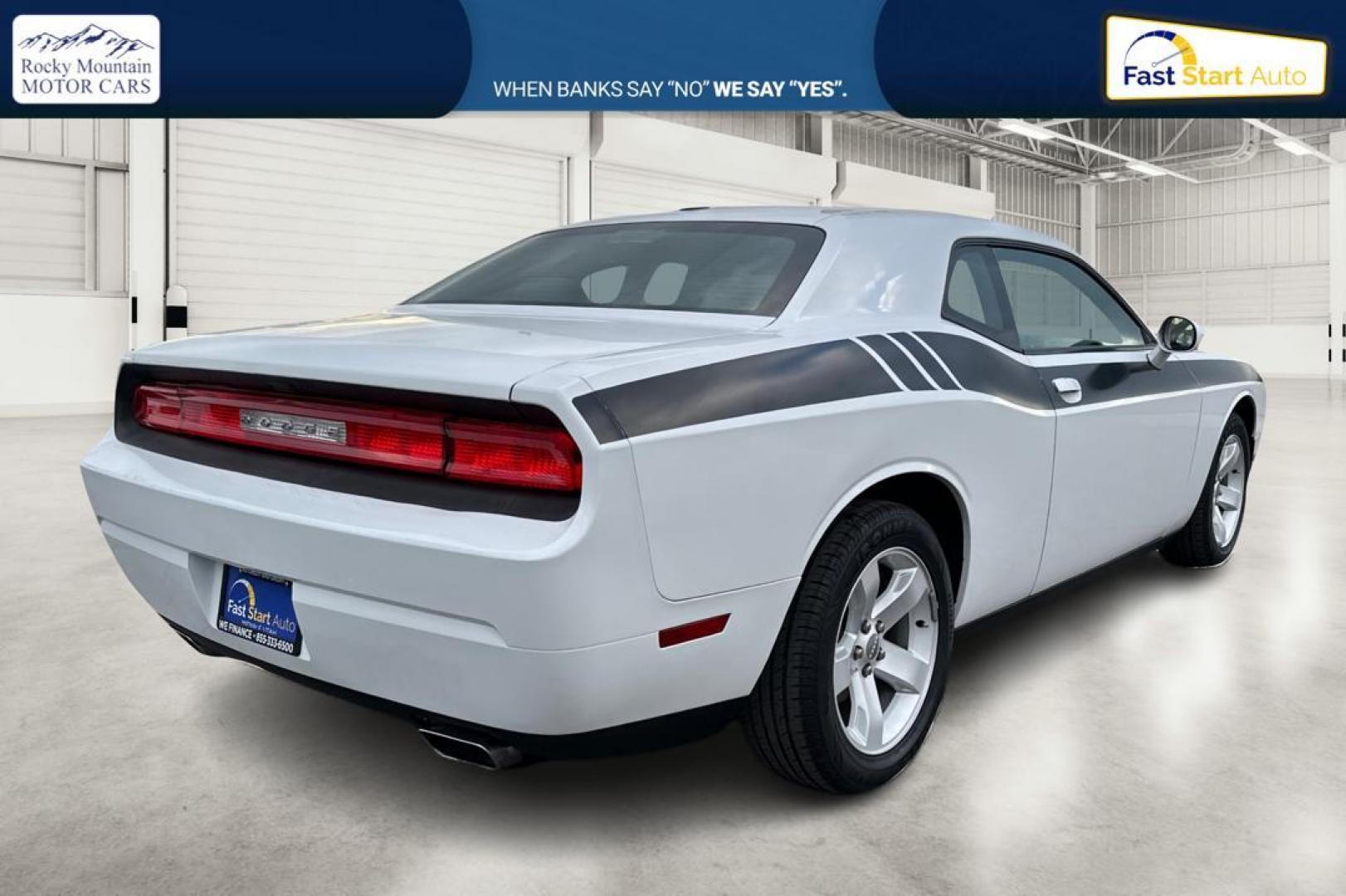 2012 White Dodge Challenger SXT (2C3CDYAG7CH) with an 3.6L V6 DOHC 24V engine, 4-Speed Automatic transmission, located at 344 S Washington Blvd, Ogden, UT, 84404, (801) 399-1799, 41.255482, -111.970848 - Photo#2