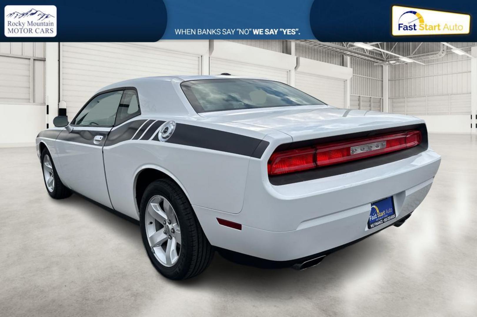 2012 White Dodge Challenger SXT (2C3CDYAG7CH) with an 3.6L V6 DOHC 24V engine, 4-Speed Automatic transmission, located at 344 S Washington Blvd, Ogden, UT, 84404, (801) 399-1799, 41.255482, -111.970848 - Photo#5