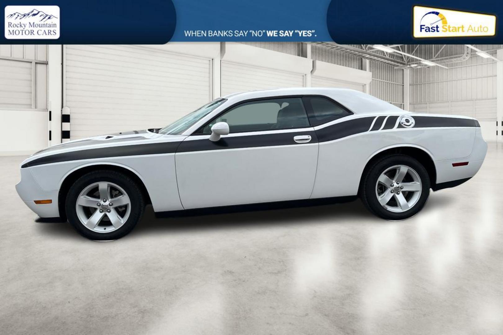 2012 White Dodge Challenger SXT (2C3CDYAG7CH) with an 3.6L V6 DOHC 24V engine, 4-Speed Automatic transmission, located at 344 S Washington Blvd, Ogden, UT, 84404, (801) 399-1799, 41.255482, -111.970848 - Photo#6