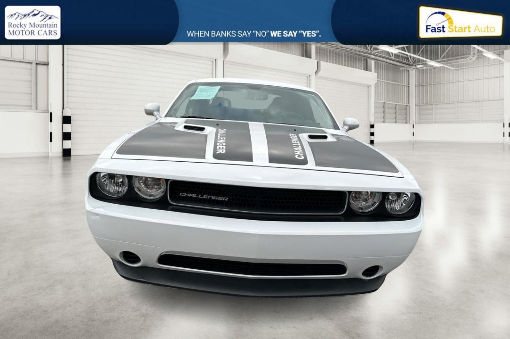 2012 White Dodge Challenger SXT (2C3CDYAG7CH) with an 3.6L V6 DOHC 24V engine, 4-Speed Automatic transmission, located at 344 S Washington Blvd, Ogden, UT, 84404, (801) 399-1799, 41.255482, -111.970848 - Photo#9