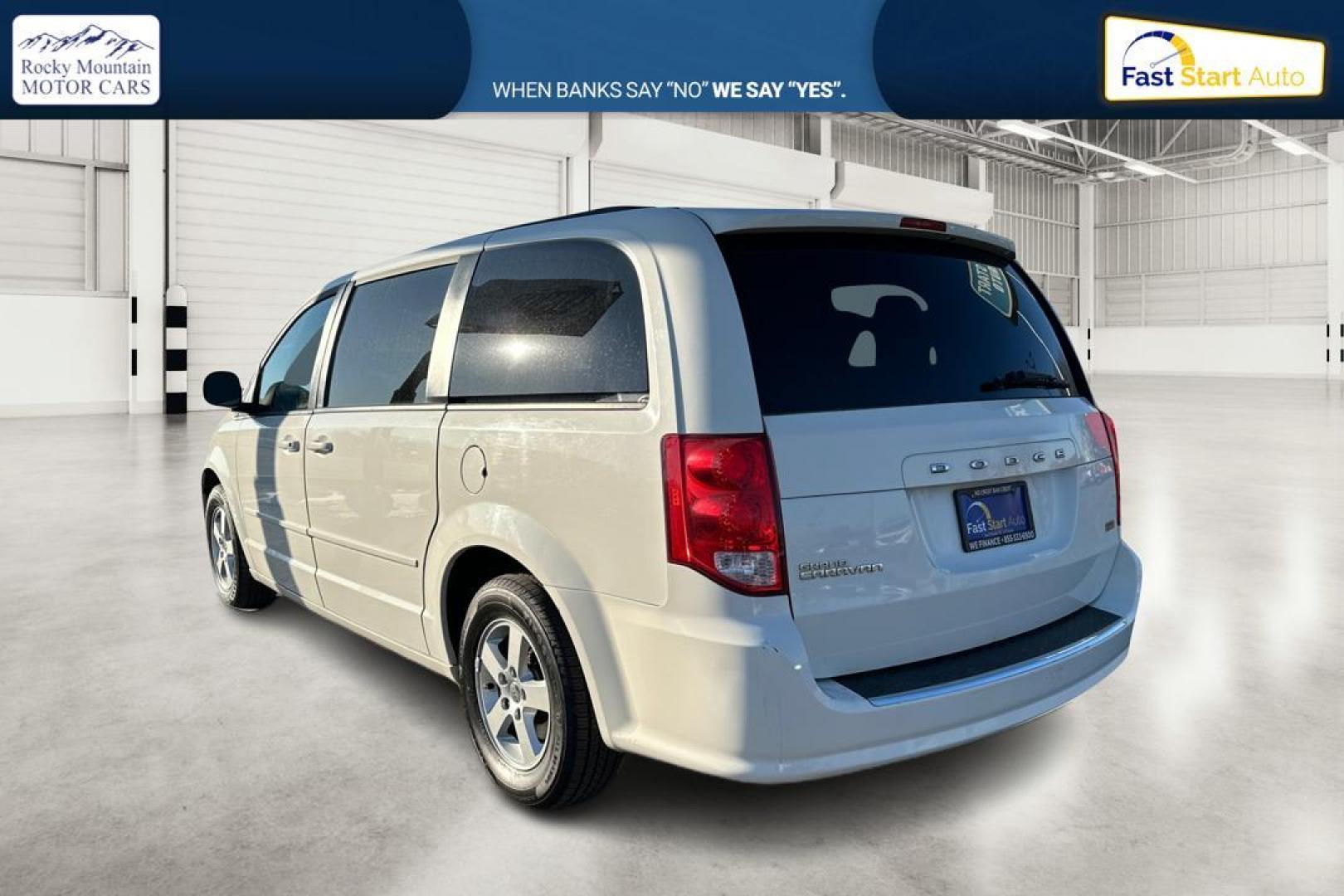 2012 White Dodge Grand Caravan SXT (2C4RDGCG9CR) with an 3.6L V6 DOHC 24V engine, 6-Speed Automatic transmission, located at 767 S State Road, Pleasant Grove, UT, 84062, (801) 785-1058, 40.354839, -111.736687 - Photo#5