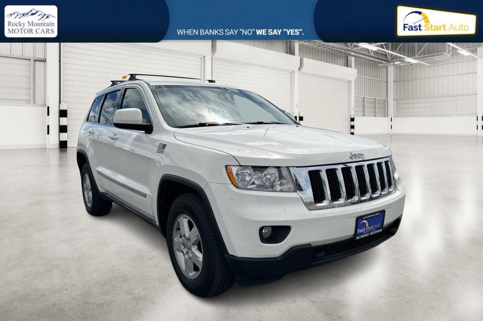2012 White Jeep Grand Cherokee Laredo 4WD (1C4RJFAG7CC) with an 3.6L V6 DOHC 24V engine, 5-Speed Automatic transmission, located at 7755 State Street, Midvale, UT, 84047, (801) 753-9063, 40.610329, -111.892159 - Photo#0