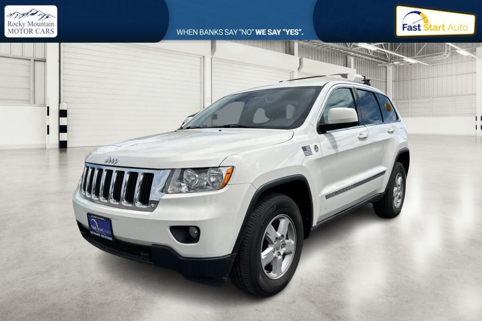 2012 White Jeep Grand Cherokee Laredo 4WD (1C4RJFAG7CC) with an 3.6L V6 DOHC 24V engine, 5-Speed Automatic transmission, located at 7755 State Street, Midvale, UT, 84047, (801) 753-9063, 40.610329, -111.892159 - Photo#6