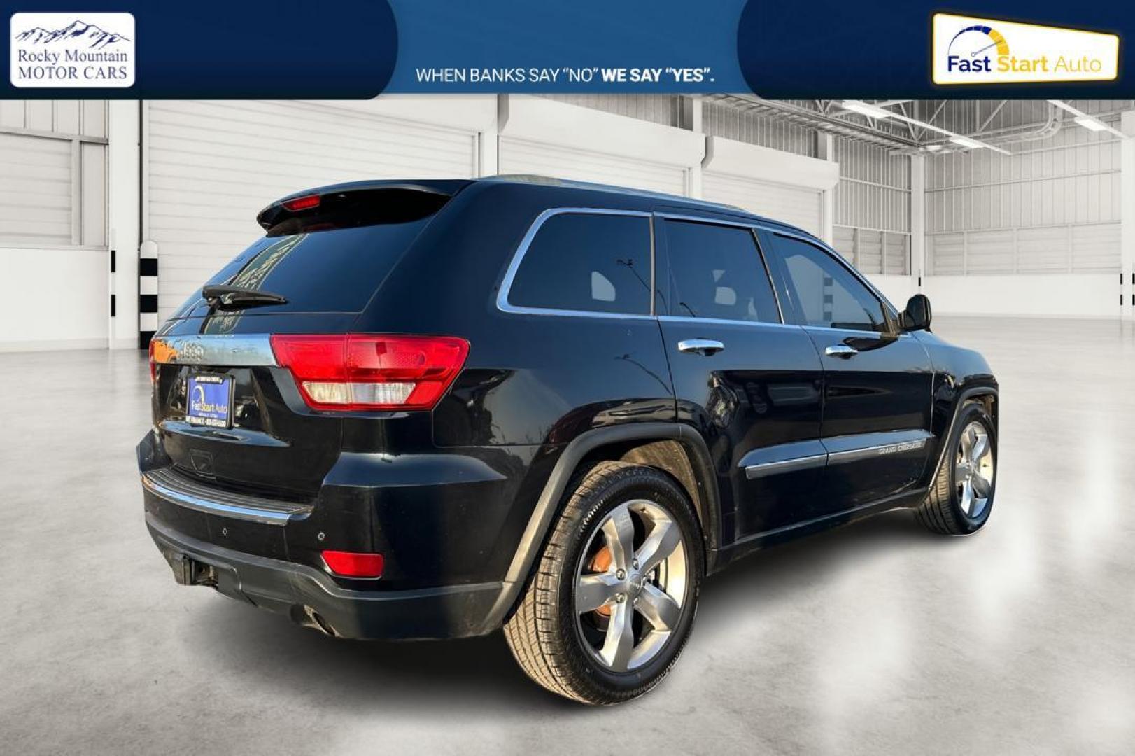 2012 Black Jeep Grand Cherokee Overland 4WD (1C4RJFCT2CC) with an 5.7L V8 OHV 16V engine, 5-Speed Automatic transmission, located at 7755 State Street, Midvale, UT, 84047, (801) 753-9063, 40.610329, -111.892159 - Photo#2