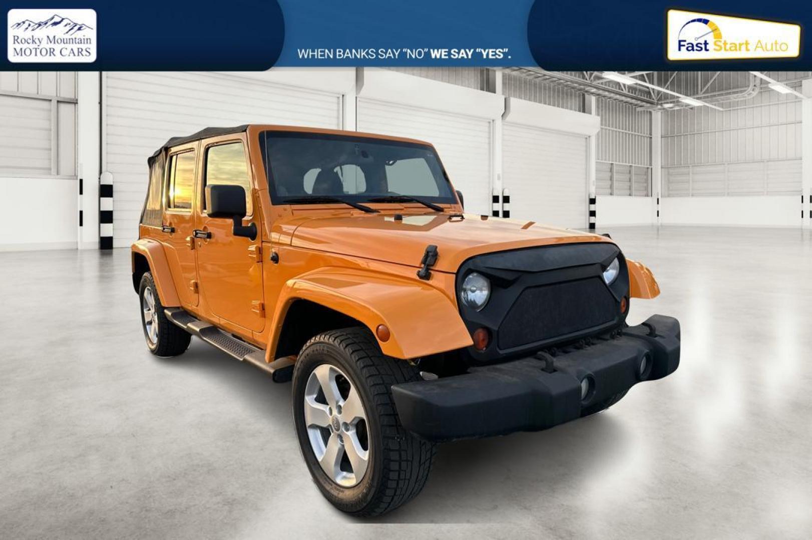 2012 Yellow Jeep Wrangler Unlimited Sahara 4WD (1C4BJWEG3CL) with an 3.6L V6 DOHC 24V FFV engine, Automatic, 5-Spd transmission, located at 7755 State Street, Midvale, UT, 84047, (801) 753-9063, 40.610329, -111.892159 - Photo#0