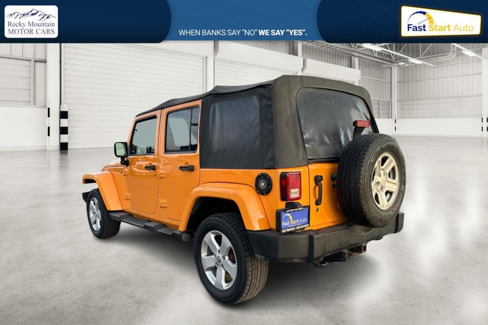 2012 Yellow Jeep Wrangler Unlimited Sahara 4WD (1C4BJWEG3CL) with an 3.6L V6 DOHC 24V FFV engine, Automatic, 5-Spd transmission, located at 7755 State Street, Midvale, UT, 84047, (801) 753-9063, 40.610329, -111.892159 - Photo#5