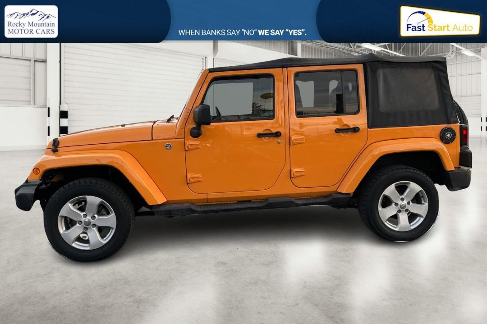 2012 Yellow Jeep Wrangler Unlimited Sahara 4WD (1C4BJWEG3CL) with an 3.6L V6 DOHC 24V FFV engine, Automatic, 5-Spd transmission, located at 7755 State Street, Midvale, UT, 84047, (801) 753-9063, 40.610329, -111.892159 - Photo#6