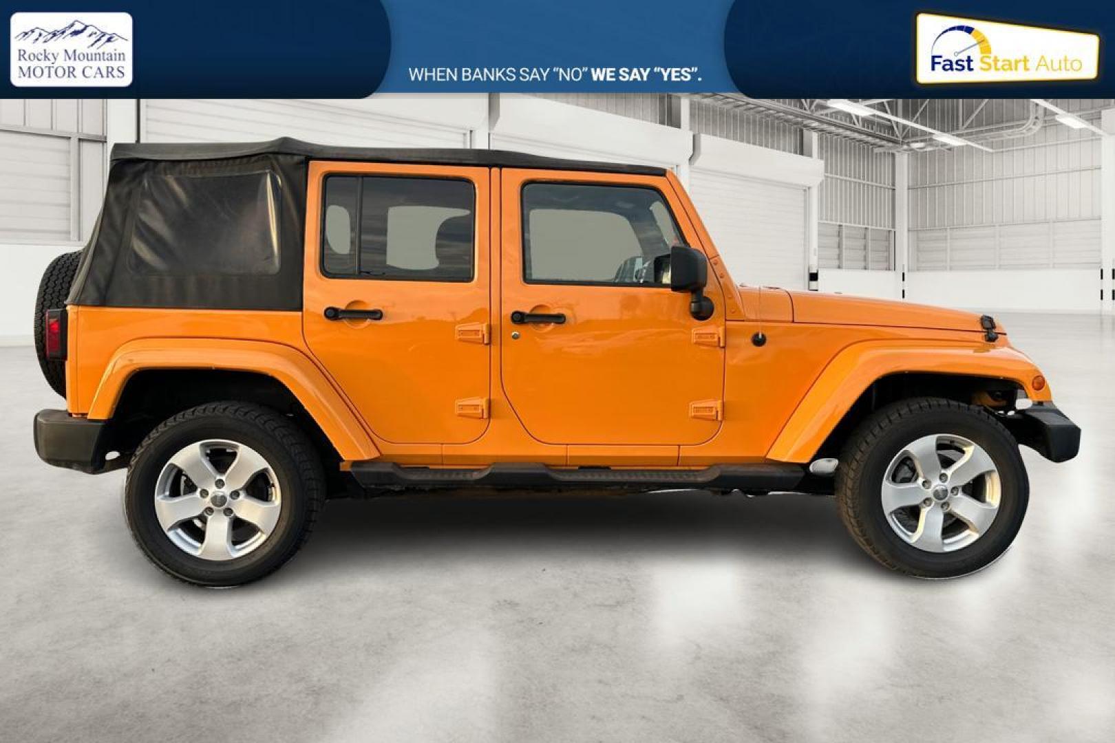 2012 Yellow Jeep Wrangler Unlimited Sahara 4WD (1C4BJWEG3CL) with an 3.6L V6 DOHC 24V FFV engine, Automatic, 5-Spd transmission, located at 7755 State Street, Midvale, UT, 84047, (801) 753-9063, 40.610329, -111.892159 - Photo#1