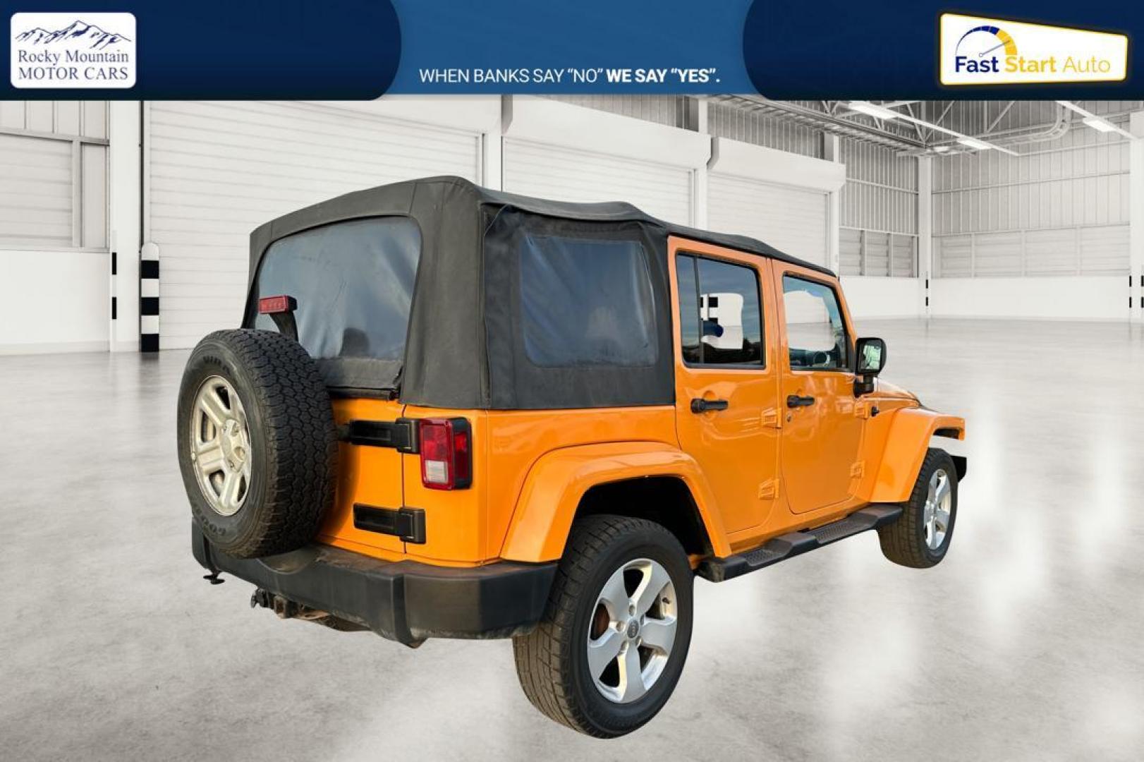 2012 Yellow Jeep Wrangler Unlimited Sahara 4WD (1C4BJWEG3CL) with an 3.6L V6 DOHC 24V FFV engine, Automatic, 5-Spd transmission, located at 7755 State Street, Midvale, UT, 84047, (801) 753-9063, 40.610329, -111.892159 - Photo#2