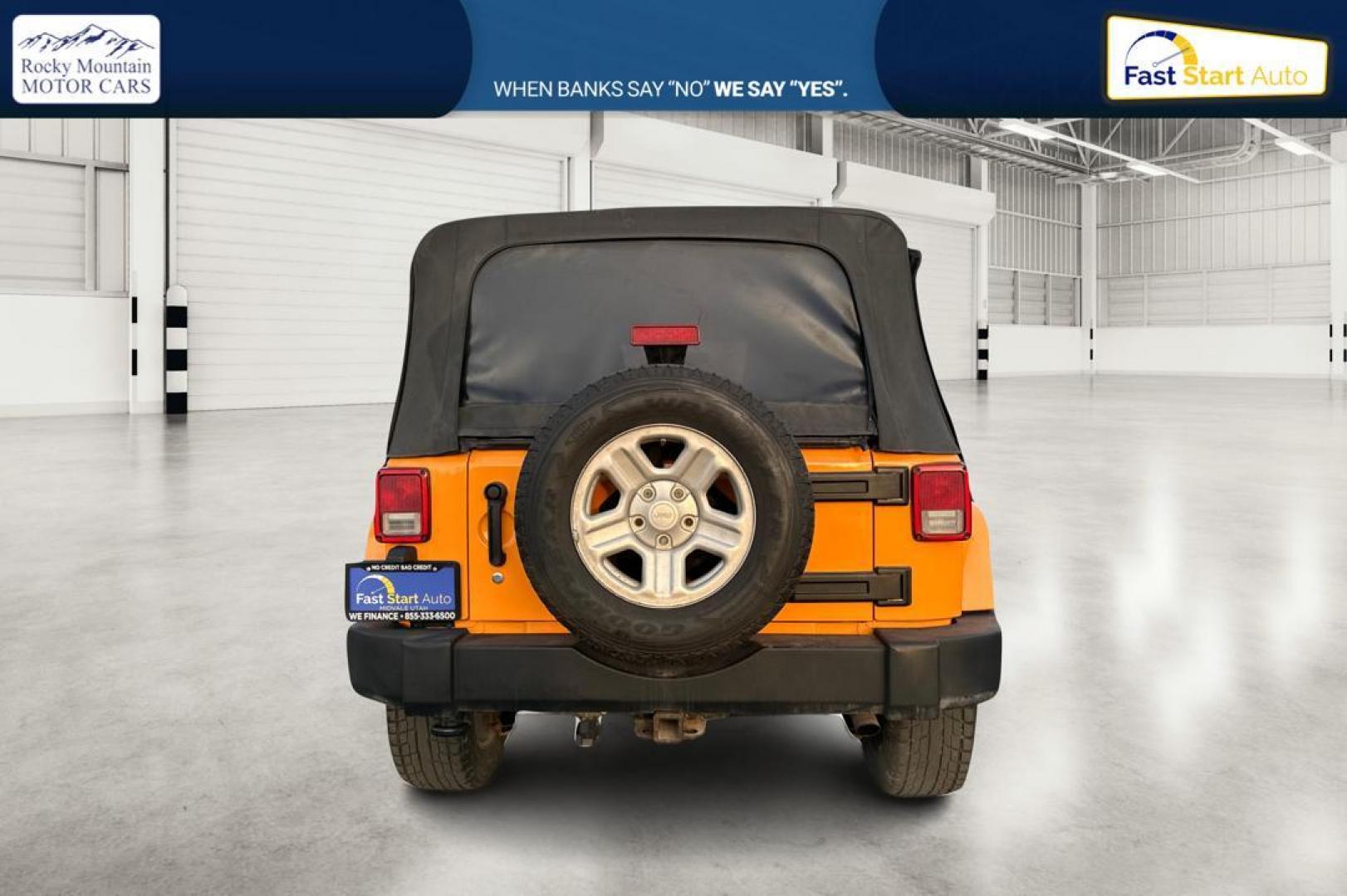 2012 Yellow Jeep Wrangler Unlimited Sahara 4WD (1C4BJWEG3CL) with an 3.6L V6 DOHC 24V FFV engine, Automatic, 5-Spd transmission, located at 7755 State Street, Midvale, UT, 84047, (801) 753-9063, 40.610329, -111.892159 - Photo#4