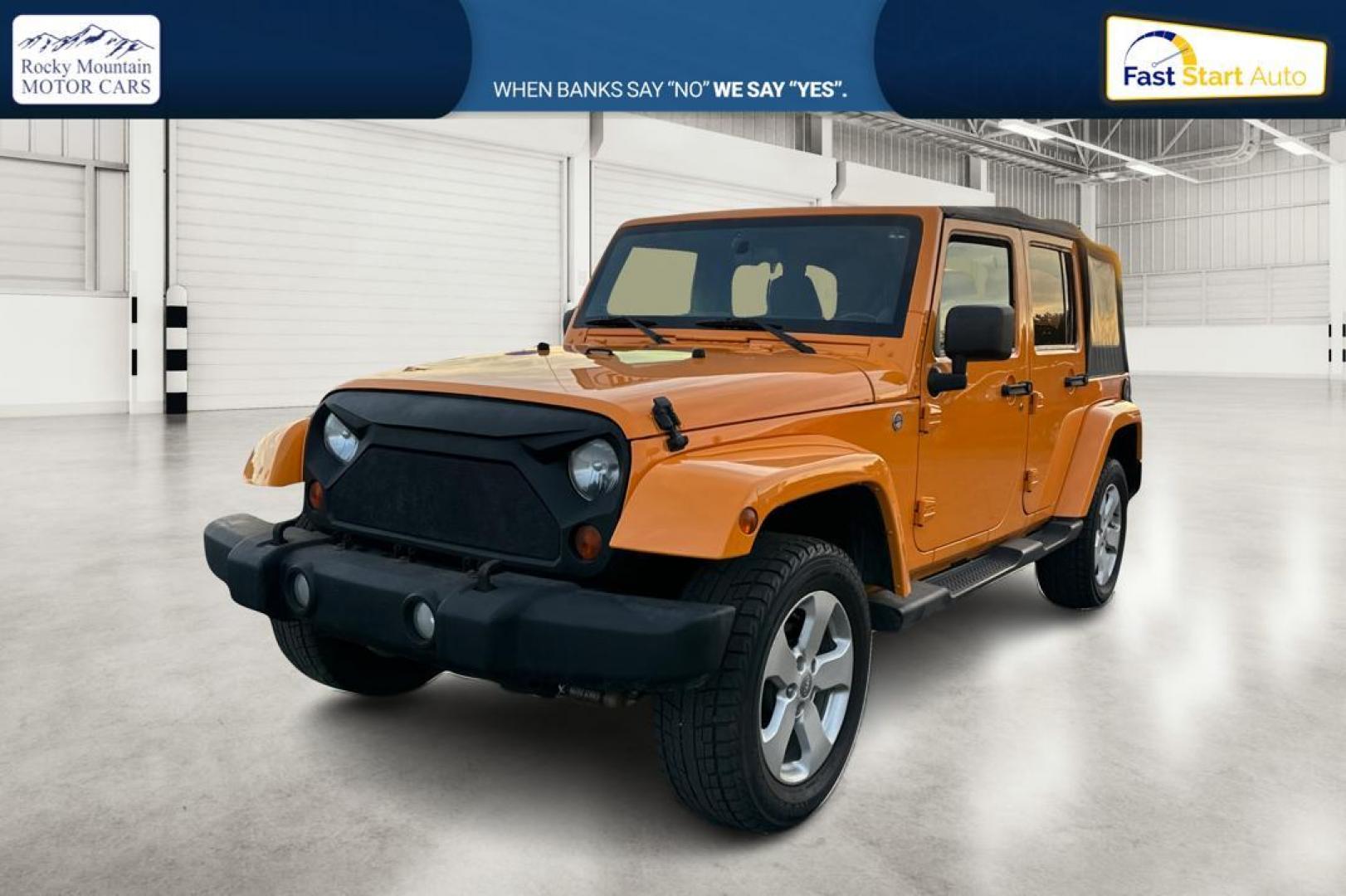 2012 Yellow Jeep Wrangler Unlimited Sahara 4WD (1C4BJWEG3CL) with an 3.6L V6 DOHC 24V FFV engine, Automatic, 5-Spd transmission, located at 7755 State Street, Midvale, UT, 84047, (801) 753-9063, 40.610329, -111.892159 - Photo#8