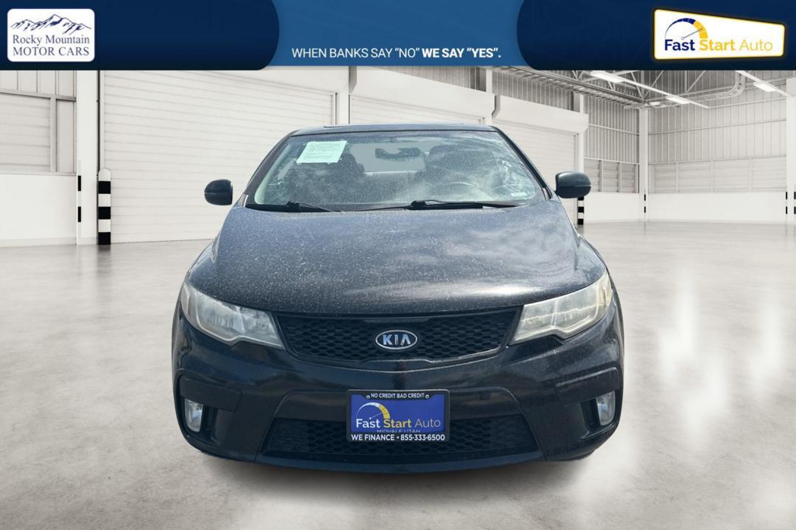 2012 Black Kia Forte Koup SX (KNAFW6A34C5) with an 2.4L L4 DOHC 16V engine, Automatic, 6-Spd w/Overdrive and Sportmatic transmission, located at 7755 State Street, Midvale, UT, 84047, (801) 753-9063, 40.610329, -111.892159 - Photo#7