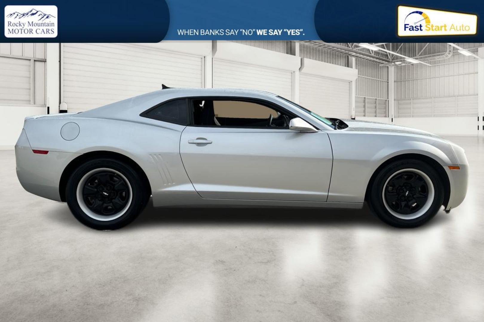 2013 Silver Chevrolet Camaro LS Coupe (2G1FE1E33D9) with an 3.6L V6 DOHC 24V FFV engine, 6-Speed Manual transmission, located at 344 S Washington Blvd, Ogden, UT, 84404, (801) 399-1799, 41.255482, -111.970848 - Photo#1