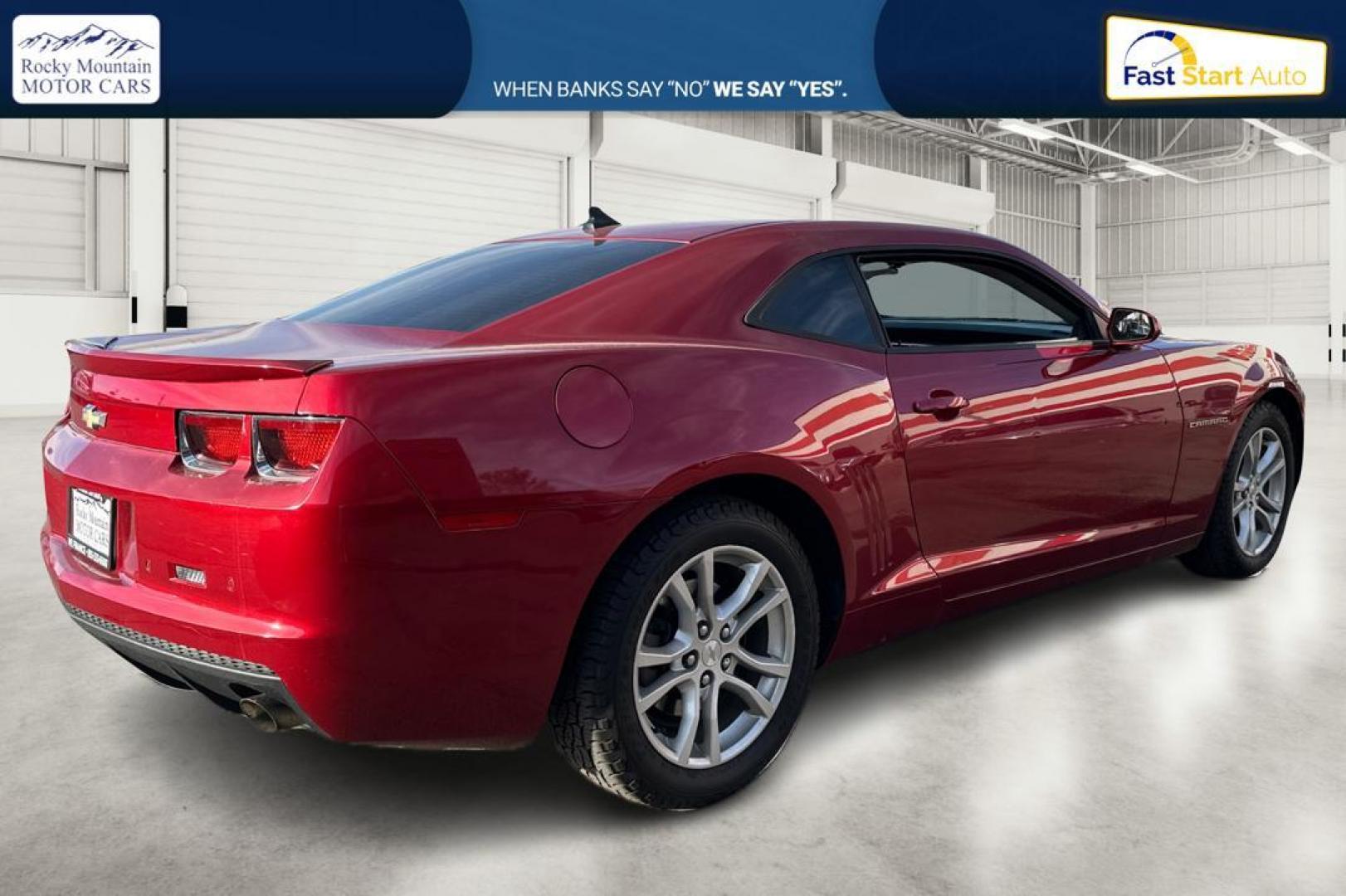 2013 Red Chevrolet Camaro Coupe 1LT (2G1FB1E38D9) with an 3.6L V6 DOHC 24V FFV engine, 6-Speed Automatic transmission, located at 344 S Washington Blvd, Ogden, UT, 84404, (801) 399-1799, 41.255482, -111.970848 - Photo#2