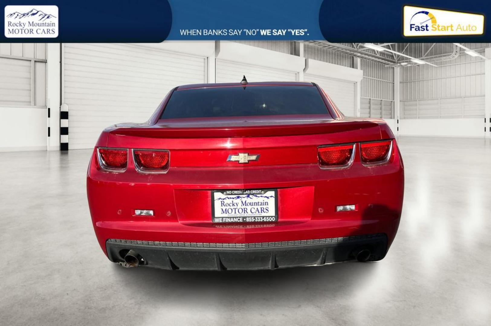 2013 Red Chevrolet Camaro Coupe 1LT (2G1FB1E38D9) with an 3.6L V6 DOHC 24V FFV engine, 6-Speed Automatic transmission, located at 344 S Washington Blvd, Ogden, UT, 84404, (801) 399-1799, 41.255482, -111.970848 - Photo#4