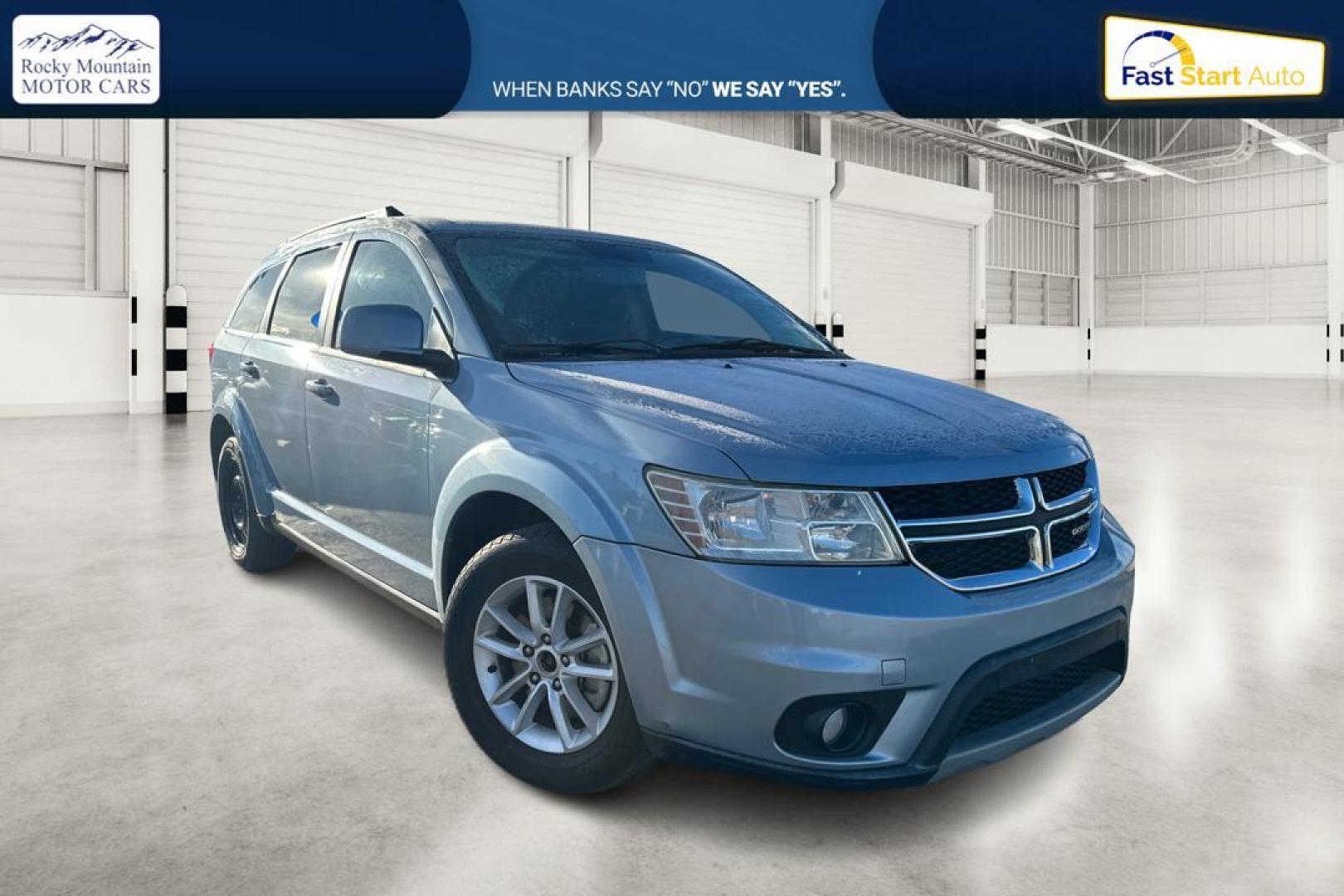 2013 Blue Dodge Journey SXT (3C4PDCBB8DT) with an 2.4L L6 DOHC 16V engine, 4-Speed Automatic transmission, located at 767 S State Road, Pleasant Grove, UT, 84062, (801) 785-1058, 40.354839, -111.736687 - Photo#0