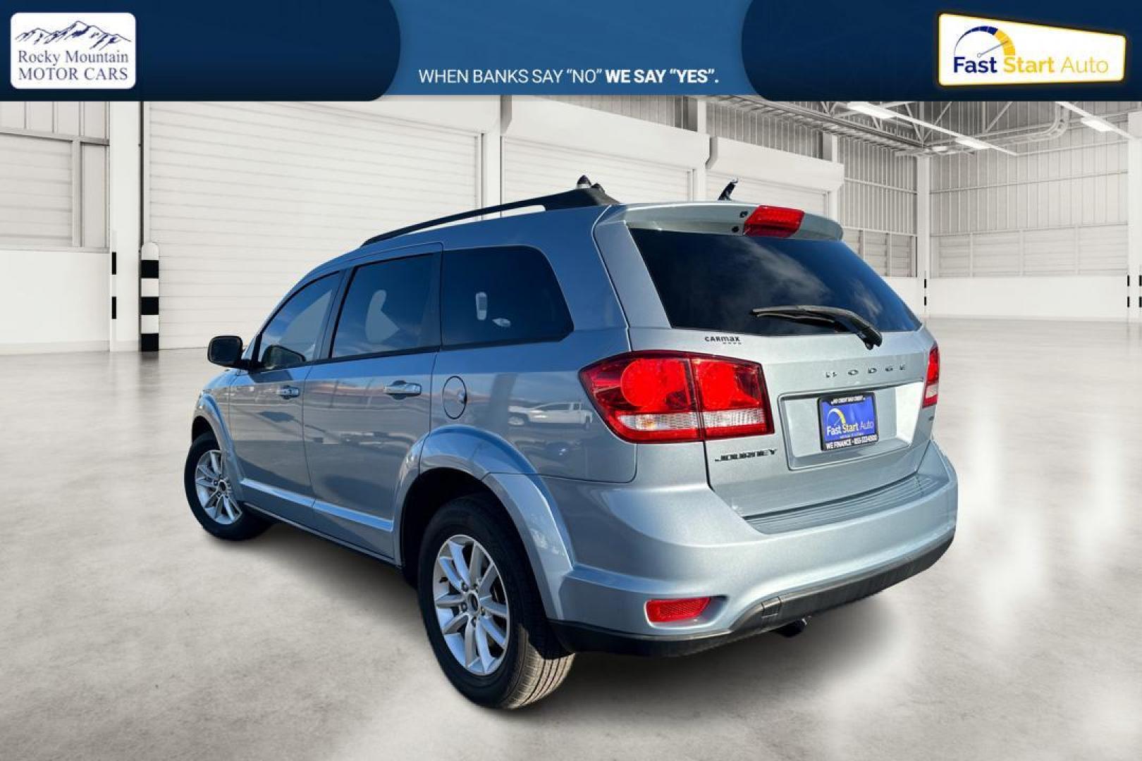 2013 Blue Dodge Journey SXT (3C4PDCBB8DT) with an 2.4L L6 DOHC 16V engine, 4-Speed Automatic transmission, located at 767 S State Road, Pleasant Grove, UT, 84062, (801) 785-1058, 40.354839, -111.736687 - Photo#4