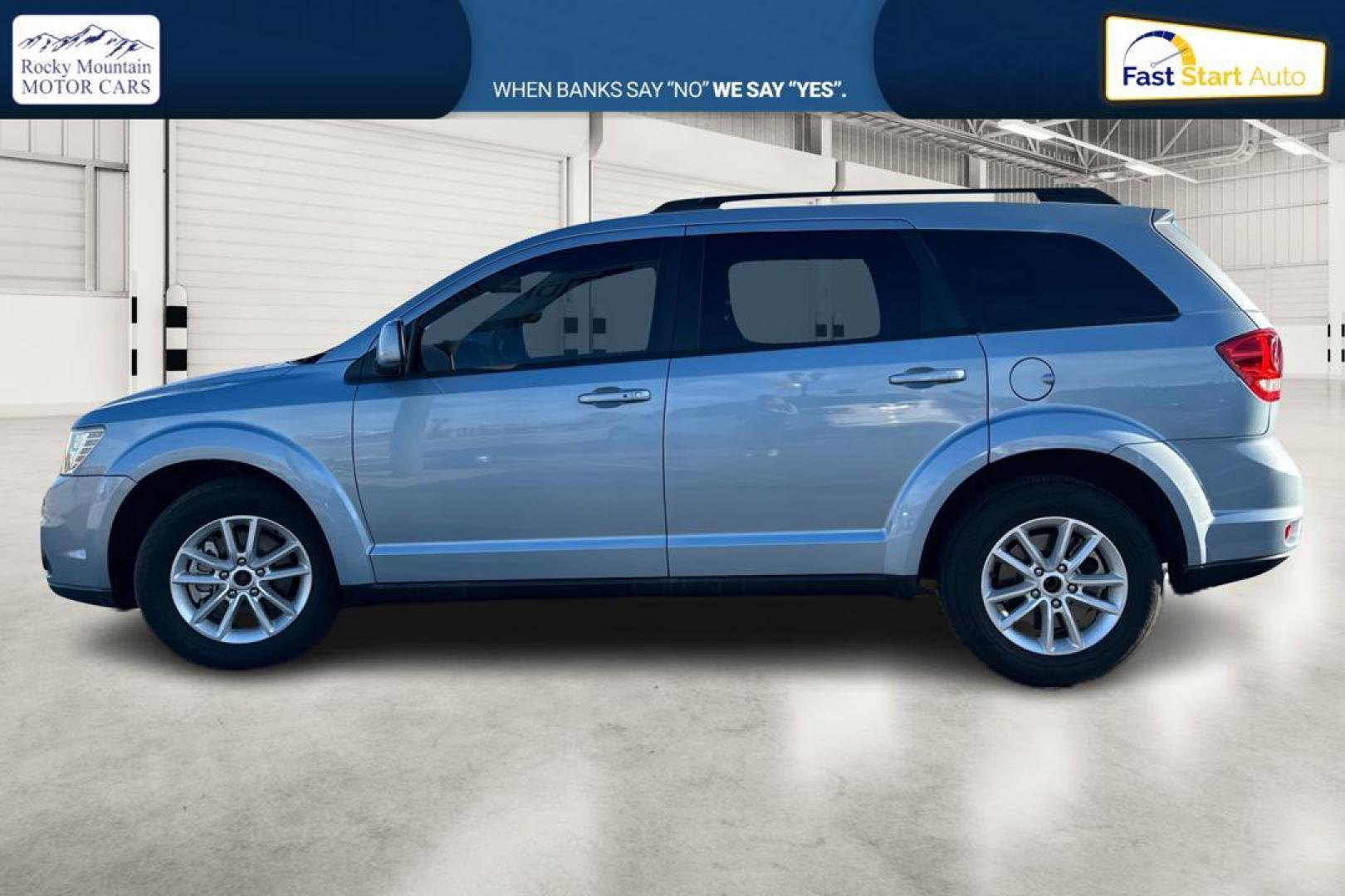 2013 Blue Dodge Journey SXT (3C4PDCBB8DT) with an 2.4L L6 DOHC 16V engine, 4-Speed Automatic transmission, located at 767 S State Road, Pleasant Grove, UT, 84062, (801) 785-1058, 40.354839, -111.736687 - Photo#5