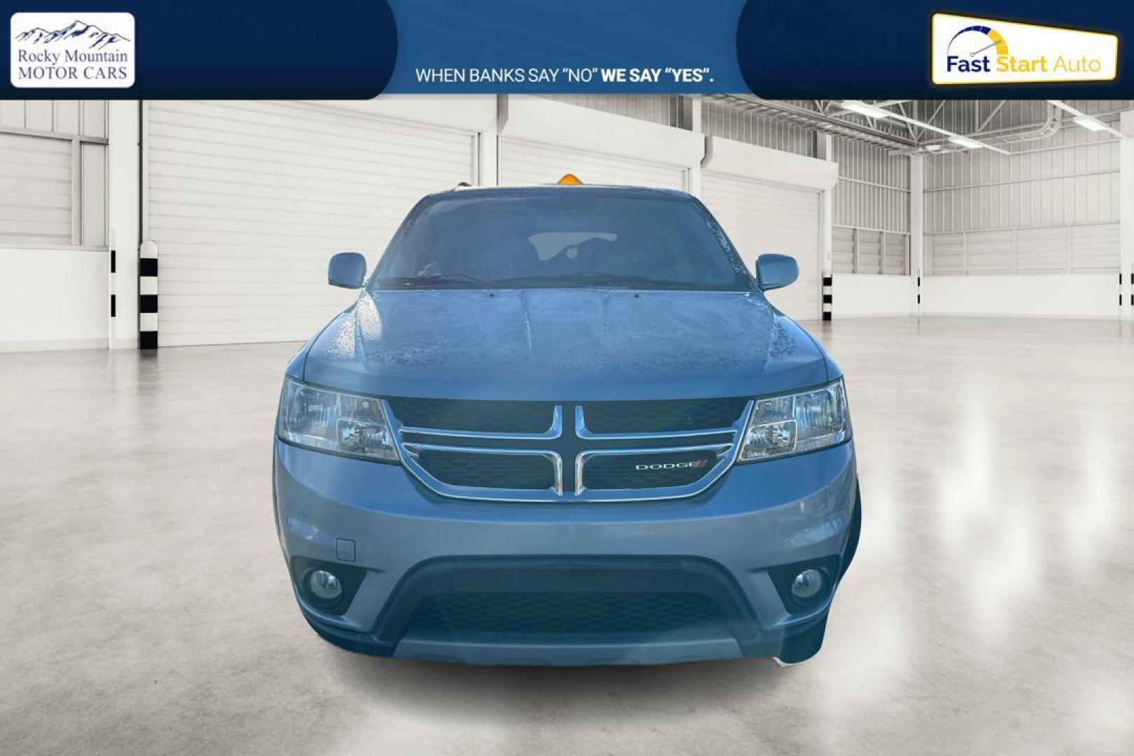 2013 Blue Dodge Journey SXT (3C4PDCBB8DT) with an 2.4L L6 DOHC 16V engine, 4-Speed Automatic transmission, located at 767 S State Road, Pleasant Grove, UT, 84062, (801) 785-1058, 40.354839, -111.736687 - Photo#7