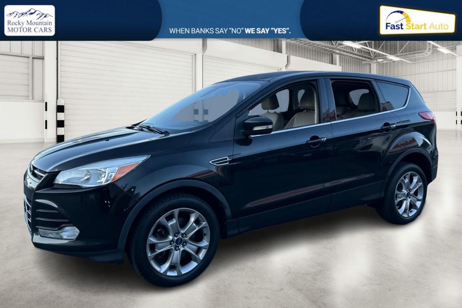 2013 Black Ford Escape SEL 4WD (1FMCU9H91DU) with an 2.0L L4 DOHC 16V engine, 6-Speed Automatic transmission, located at 7755 State Street, Midvale, UT, 84047, (801) 753-9063, 40.610329, -111.892159 - Photo#6