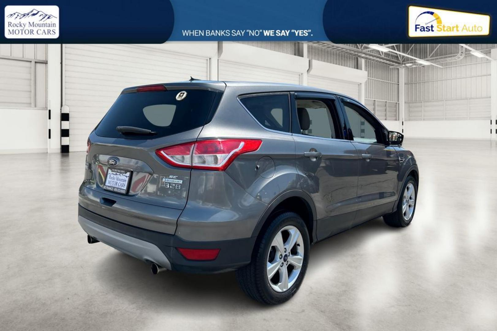 2013 Gray Ford Escape SE FWD (1FMCU0G9XDU) with an 2.0L L4 DOHC 16V engine, 6-Speed Automatic transmission, located at 767 S State Road, Pleasant Grove, UT, 84062, (801) 785-1058, 40.354839, -111.736687 - Photo#2