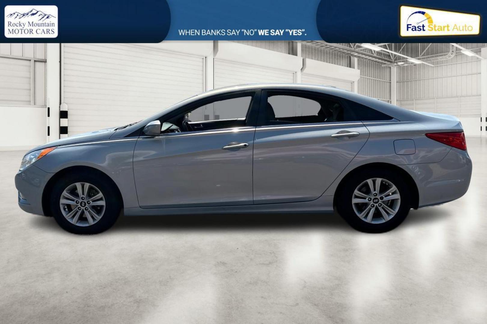 2013 Silver Hyundai Sonata GLS (5NPEB4AC1DH) with an 2.4L L4 DOHC 16V engine, 6-Speed Automatic transmission, located at 344 S Washington Blvd, Ogden, UT, 84404, (801) 399-1799, 41.255482, -111.970848 - Photo#5