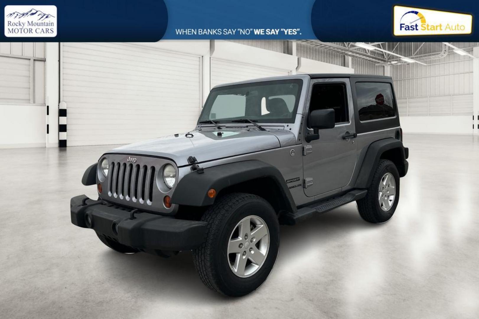 2013 Silver Jeep Wrangler Sport 4WD (1C4GJWAG0DL) with an 3.6L V6 DOHC 24V FFV engine, Automatic, 5-Spd transmission, located at 767 S State Road, Pleasant Grove, UT, 84062, (801) 785-1058, 40.354839, -111.736687 - Photo#8