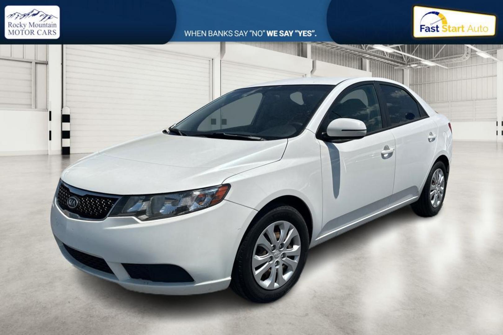 2013 White Kia Forte EX (KNAFU4A29D5) with an 2.0L L4 DOHC 16V engine, Auto, 6-Spd w/Sportmatic transmission, located at 344 S Washington Blvd, Ogden, UT, 84404, (801) 399-1799, 41.255482, -111.970848 - Photo#6