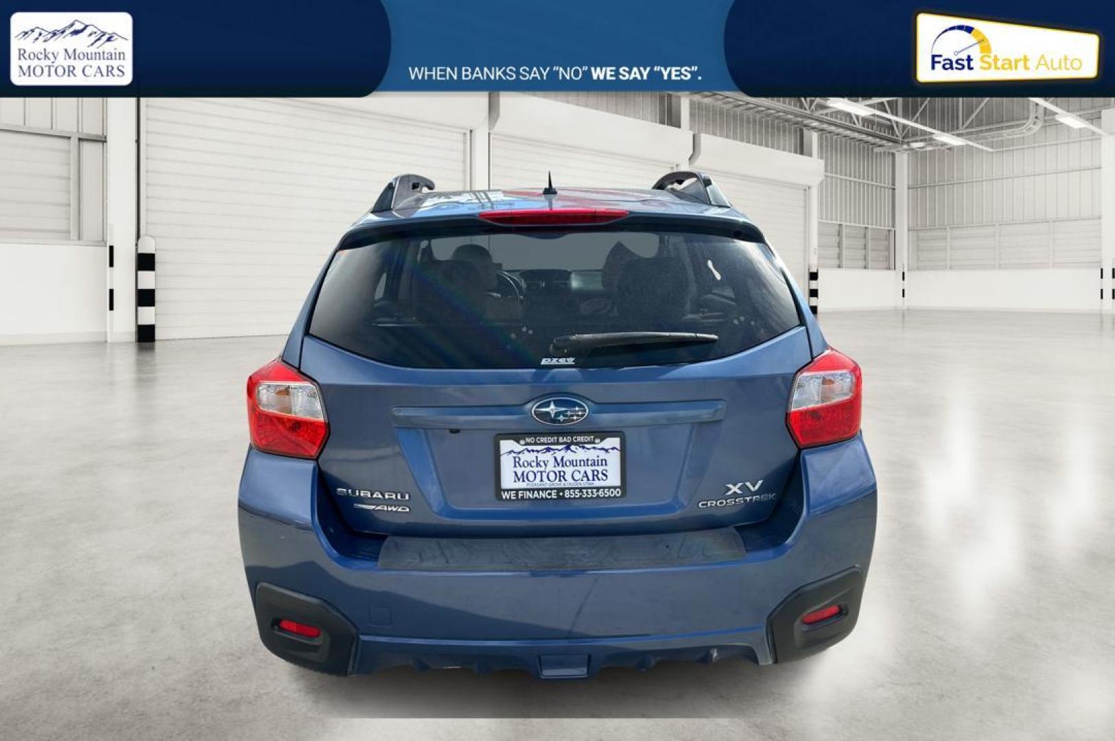 2013 Blue Subaru XV Crosstrek 2.0 Limited (JF2GPAGC2DH) with an 2.0L L4 DOHC 16V engine, Continuously Variable Transmission transmission, located at 344 S Washington Blvd, Ogden, UT, 84404, (801) 399-1799, 41.255482, -111.970848 - Photo#4