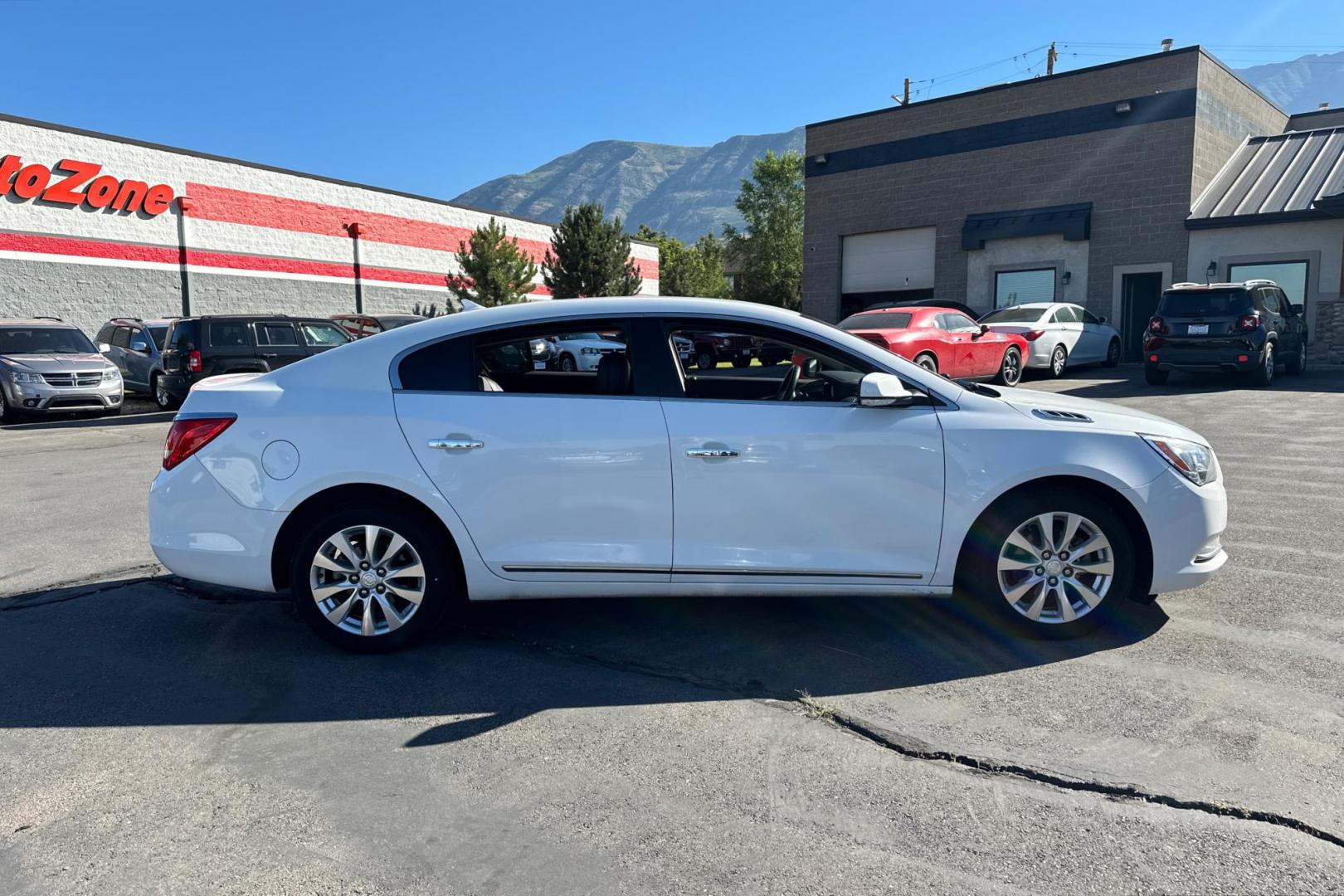 2014 White Buick LaCrosse Leather Package (1G4GB5GR0EF) with an 2.4L L4 DOHC 16V engine, 6-Speed Automatic transmission, located at 767 S State Road, Pleasant Grove, UT, 84062, (801) 785-1058, 40.354839, -111.736687 - Photo#1