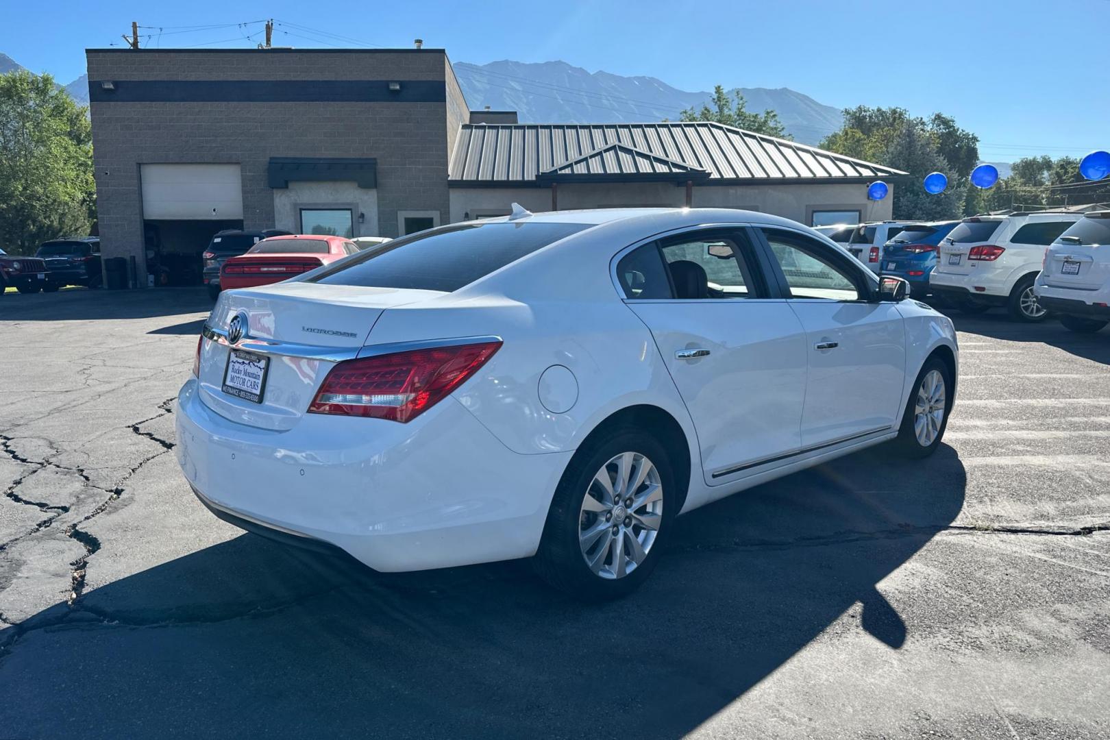 2014 White Buick LaCrosse Leather Package (1G4GB5GR0EF) with an 2.4L L4 DOHC 16V engine, 6-Speed Automatic transmission, located at 767 S State Road, Pleasant Grove, UT, 84062, (801) 785-1058, 40.354839, -111.736687 - Photo#2