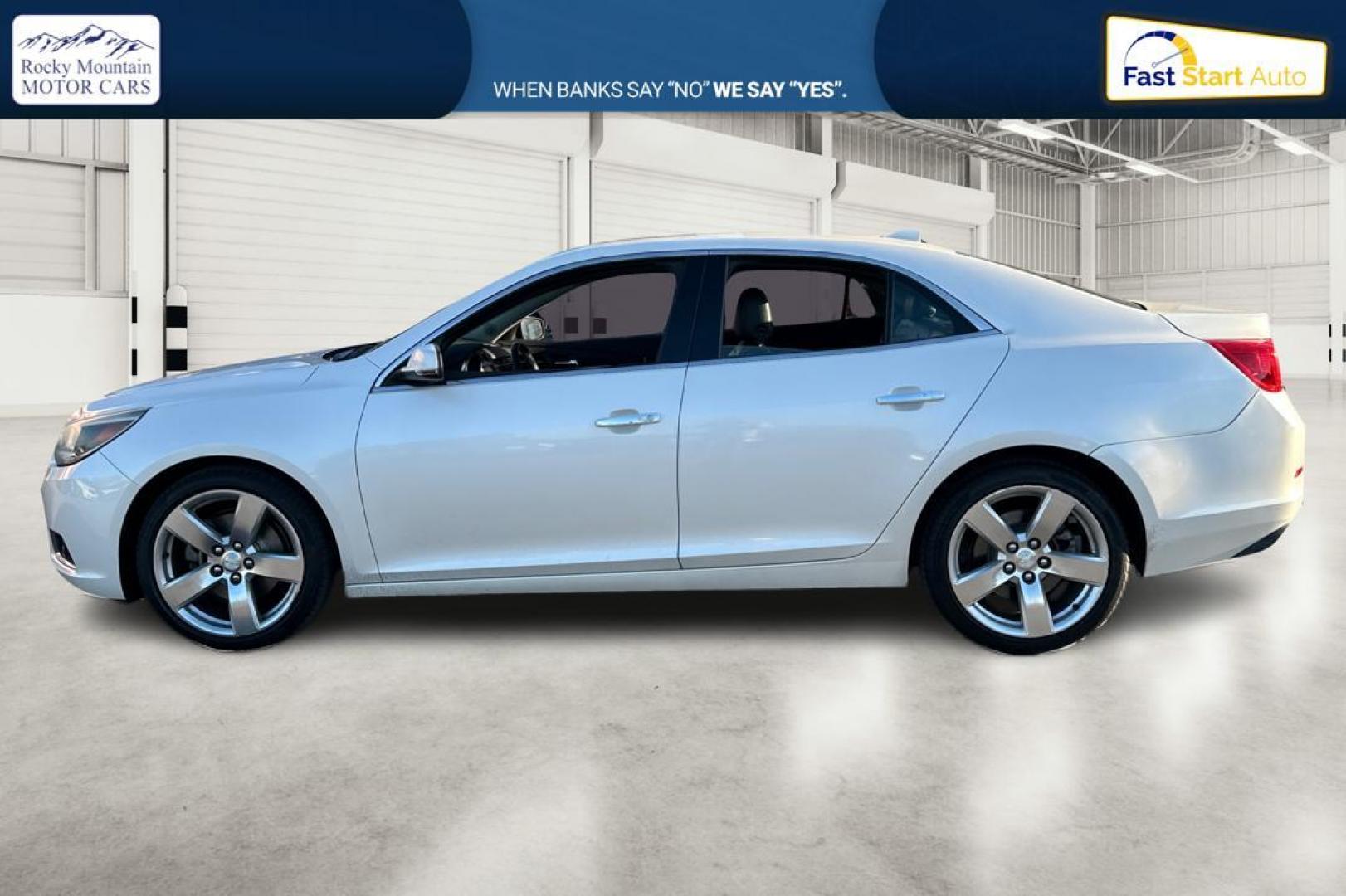 2014 White Chevrolet Malibu 2LZ (1G11J5SX5EF) with an 2.0L L4 DOHC 16V engine, 6-Speed Automatic transmission, located at 767 S State Road, Pleasant Grove, UT, 84062, (801) 785-1058, 40.354839, -111.736687 - Photo#5