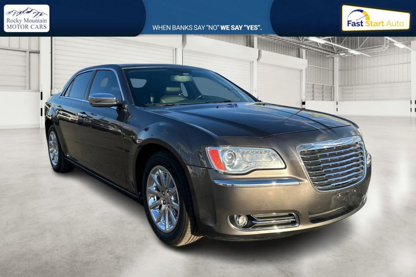 2014 Gray Chrysler 300 C RWD (2C3CCAET3EH) with an 5.7L V8 OHV 16V engine, 5-Speed Automatic transmission, located at 7755 State Street, Midvale, UT, 84047, (801) 753-9063, 40.610329, -111.892159 - Photo#0