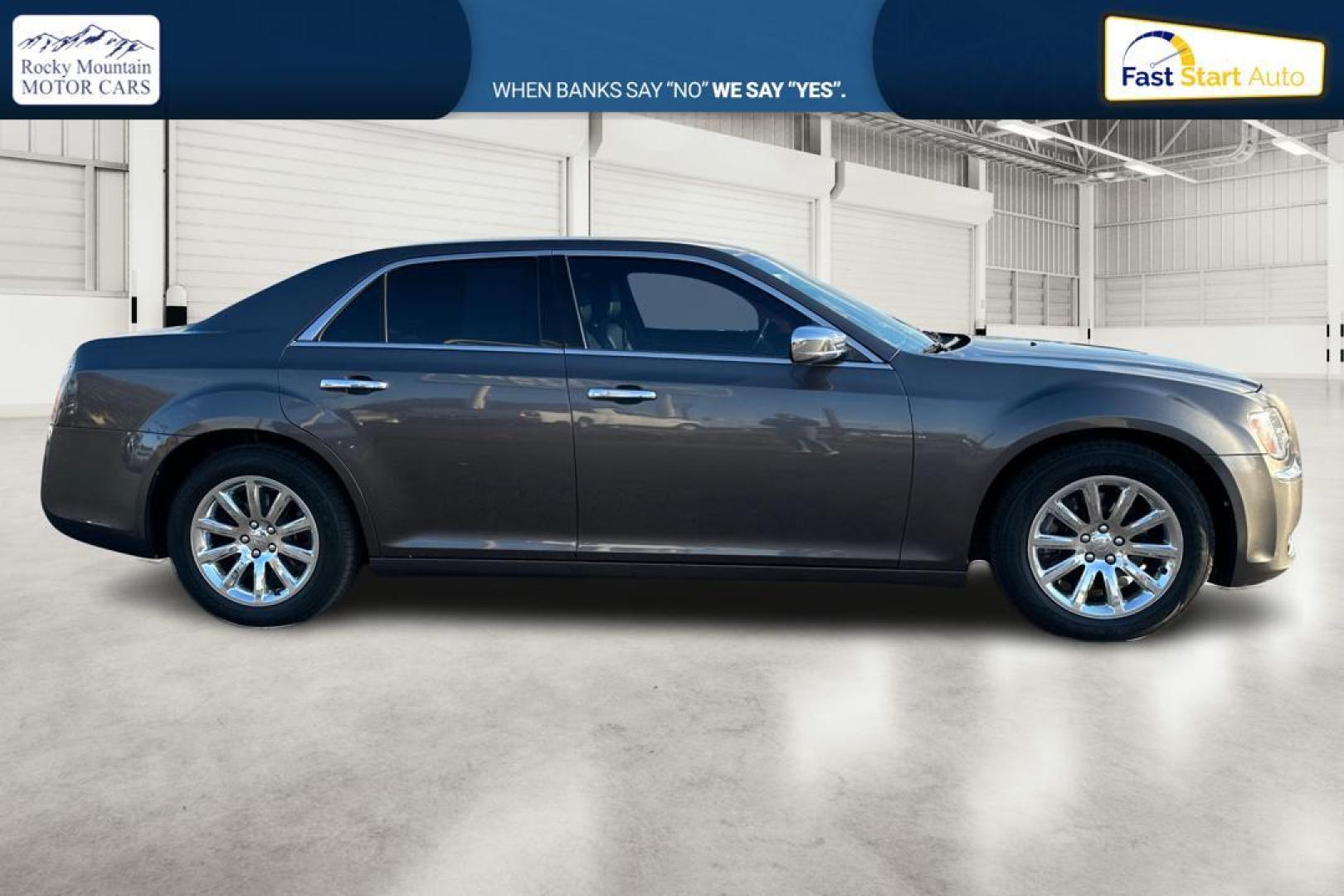 2014 Gray Chrysler 300 C RWD (2C3CCAET3EH) with an 5.7L V8 OHV 16V engine, 5-Speed Automatic transmission, located at 7755 State Street, Midvale, UT, 84047, (801) 753-9063, 40.610329, -111.892159 - Photo#1