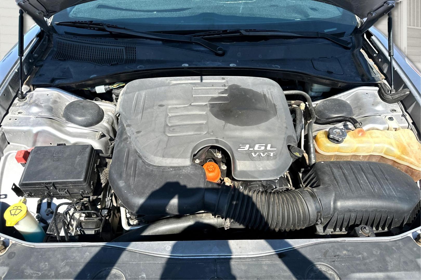 2014 Silver Dodge Charger SE (2C3CDXBG9EH) with an 3.6L V6 DOHC 24V engine, 5-Speed Automatic transmission, located at 767 S State Road, Pleasant Grove, UT, 84062, (801) 785-1058, 40.354839, -111.736687 - Photo#8